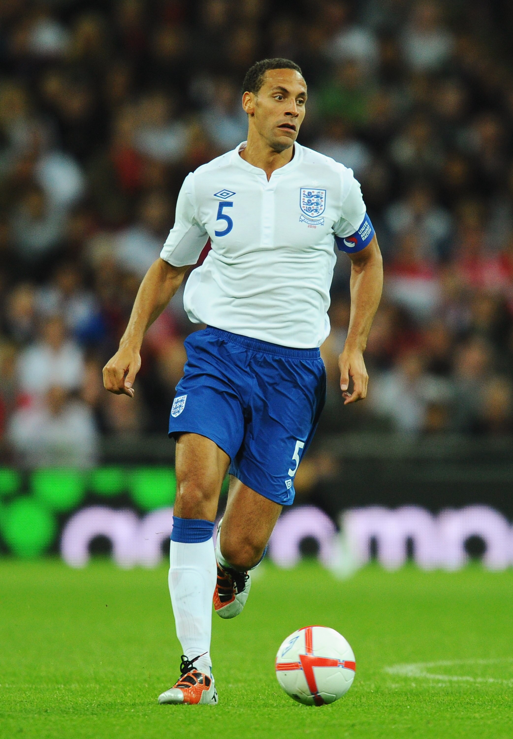 LONDON, ENGLAND - OCTOBER 12: Rio Ferdinand of England in action during the UEFA EURO 2012 Group G Qualifying match between England and Montenegro at Wembley Stadium on October 12, 2010 in London, England.  (Photo by Mike Hewitt/Getty Images)
