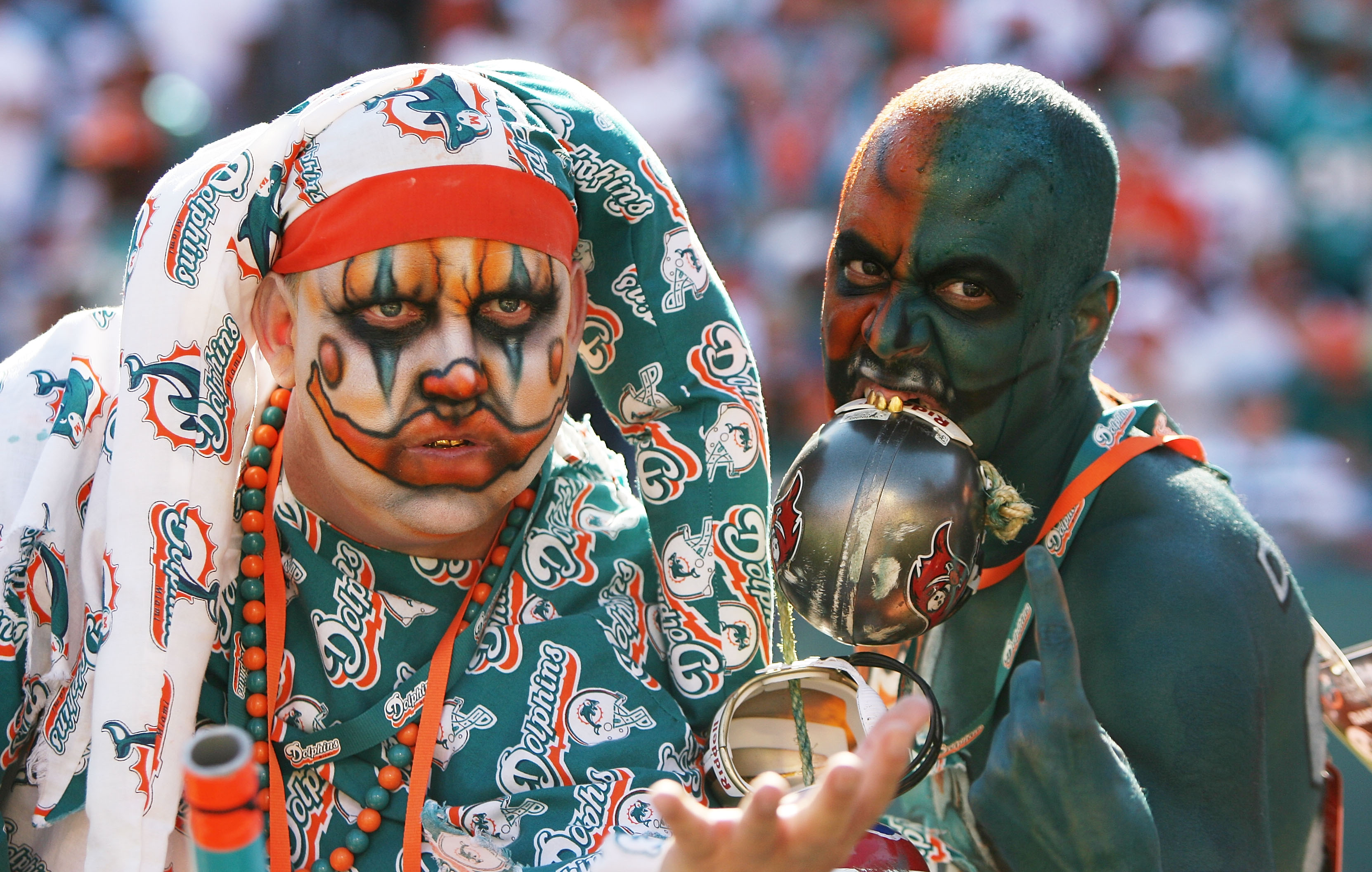 MIAMI GARDENS, FL - NOVEMBER 15:  Dolfan Bandits Shane Meyer, L, and Manny Lopez cheer as the Tampa Bay Buccaneers take on the Miami Dolphins at Land Shark Stadium on November 15, 2009 in Miami Gardens, Florida. The Dolphins defeated the Buccaneers 25-23.