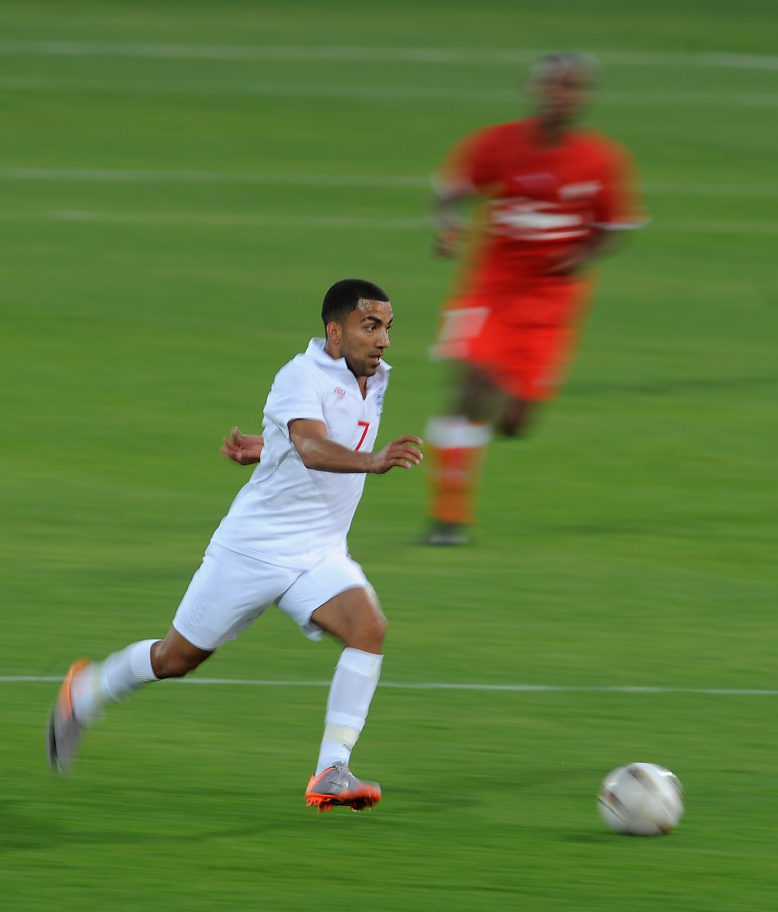 MORULENG, SOUTH AFRICA - JUNE 07: Aaron Lennon of England in action during the friendly match between England and Platinum Stars at the Moruleng Stadium on June 7, 2010 in Moruleng, South Africa.  (Photo by Michael Regan/Getty Images)