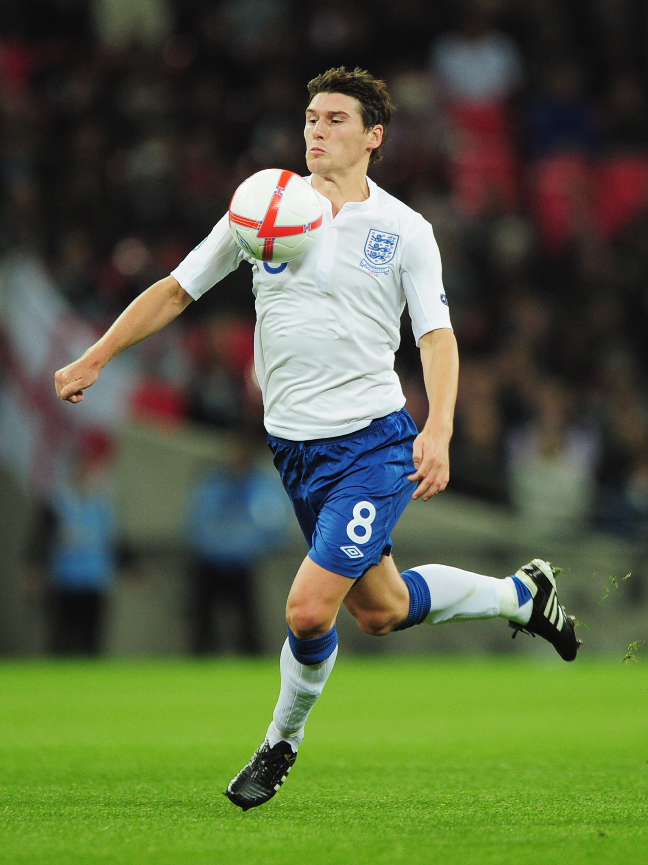 LONDON, ENGLAND - OCTOBER 12: Gareth Barry of England controls the ball during the UEFA EURO 2012 Group G Qualifying match between England and Montenegro at Wembley Stadium on October 12, 2010 in London, England.  (Photo by Shaun Botterill/Getty Images)