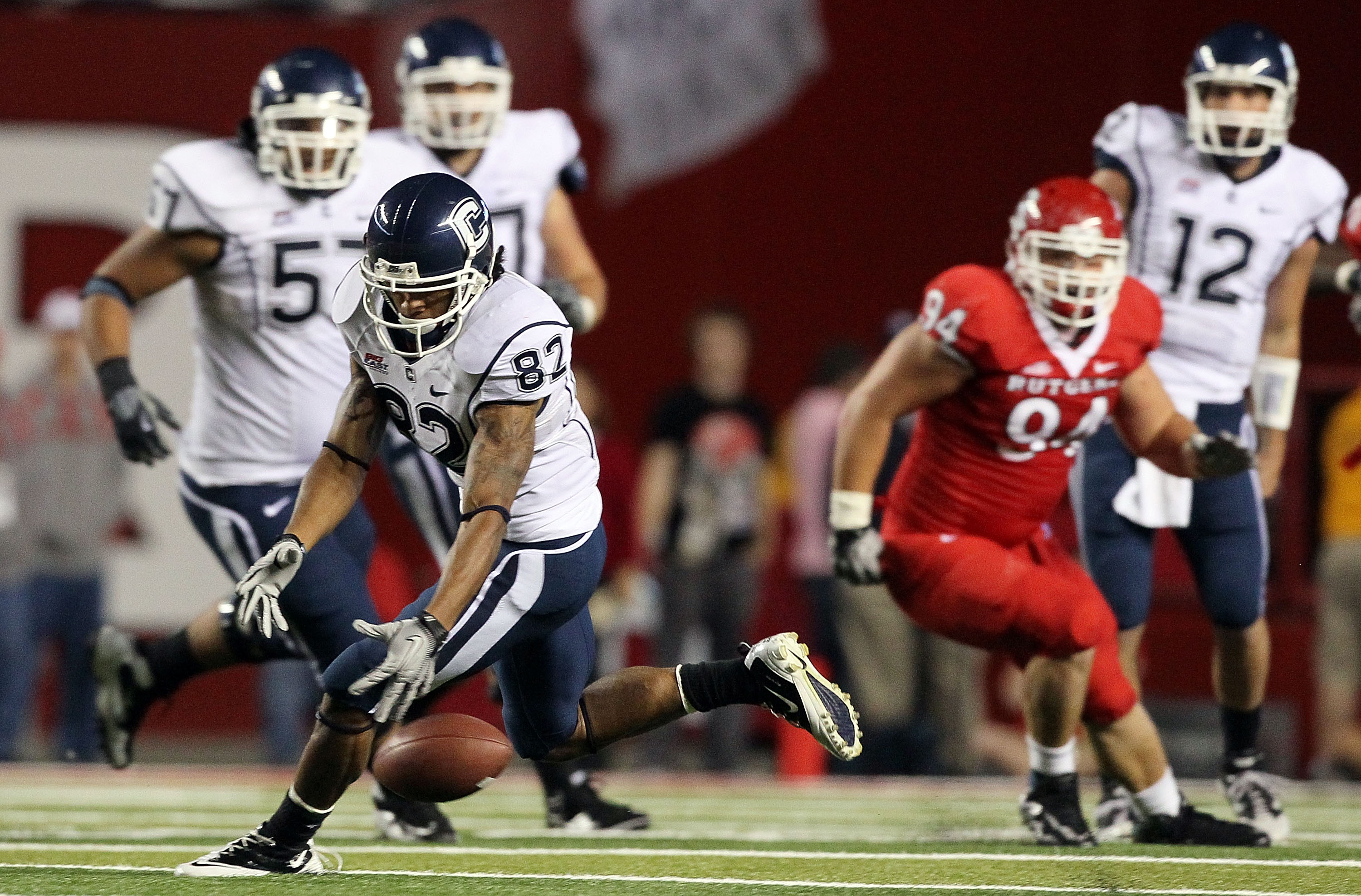 PISCATAWAY, NJ - OCTOBER 08:  Kashif Moore #82 of the Connecticut Huskies drops a pass late in the game against the Rutgers Scarlet Knights at Rutgers Stadium on October 8, 2010 in Piscataway, New Jersey. Rutgers defeated UConn 27-24.  (Photo by Jim McIsa