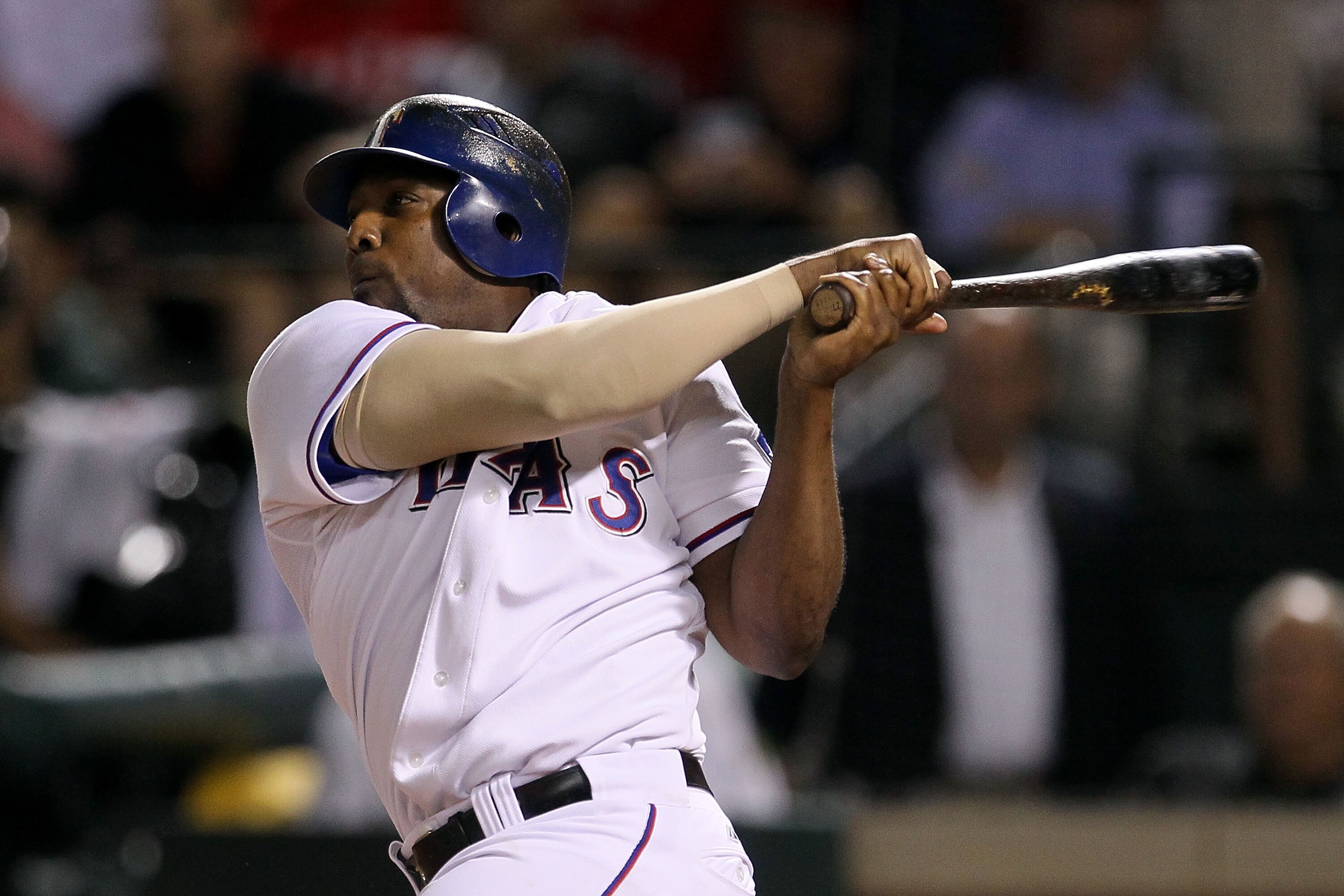 ARLINGTON, TX - OCTOBER 22:  Vladimir Guerrero #27 of the Texas Rangers hits a two run double against the New York Yankees in the fifth inning of Game Six of the ALCS during the 2010 MLB Playoffs at Rangers Ballpark in Arlington on October 22, 2010 in Arl