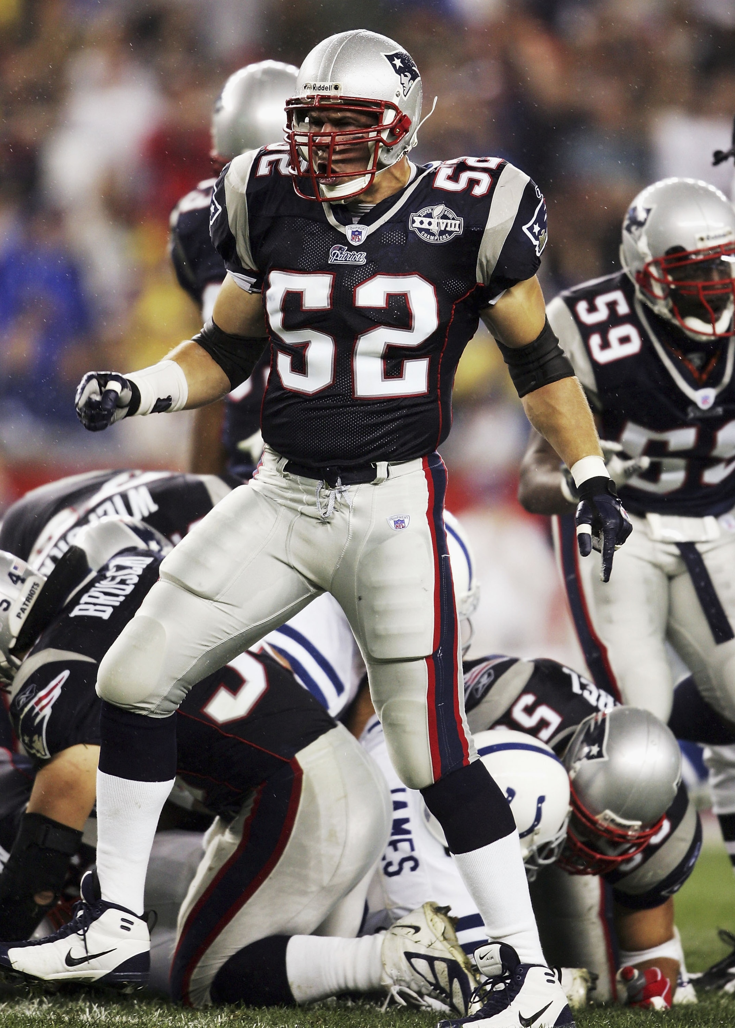 FOXBORO, MA - SEPTEMBER 9:  Ted Johnson #52 of the New England Patriots  celebrates a defensive stop against the Indianapolis Colts during the NFL game at Gillette Stadium on September 9, 2004 in Foxboro, Massachusetts. (Photo by Andy Lyons/Getty Images)