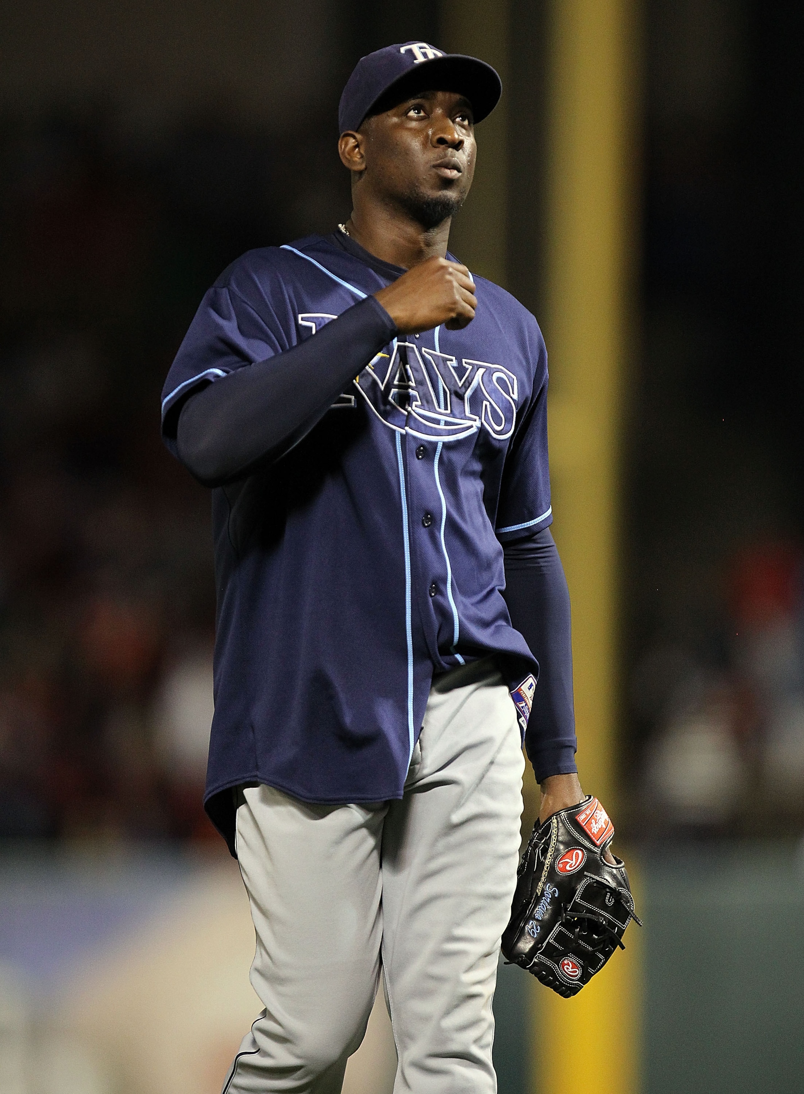 ARLINGTON, TX - OCTOBER 09:  Pitcher Rafael Soriano #29 of the Tampa Bay Rays reacts after a 6-3 win against the Texas Rangers during game 3 of the ALDS at Rangers Ballpark in Arlington on October 9, 2010 in Arlington, Texas.  (Photo by Ronald Martinez/Ge