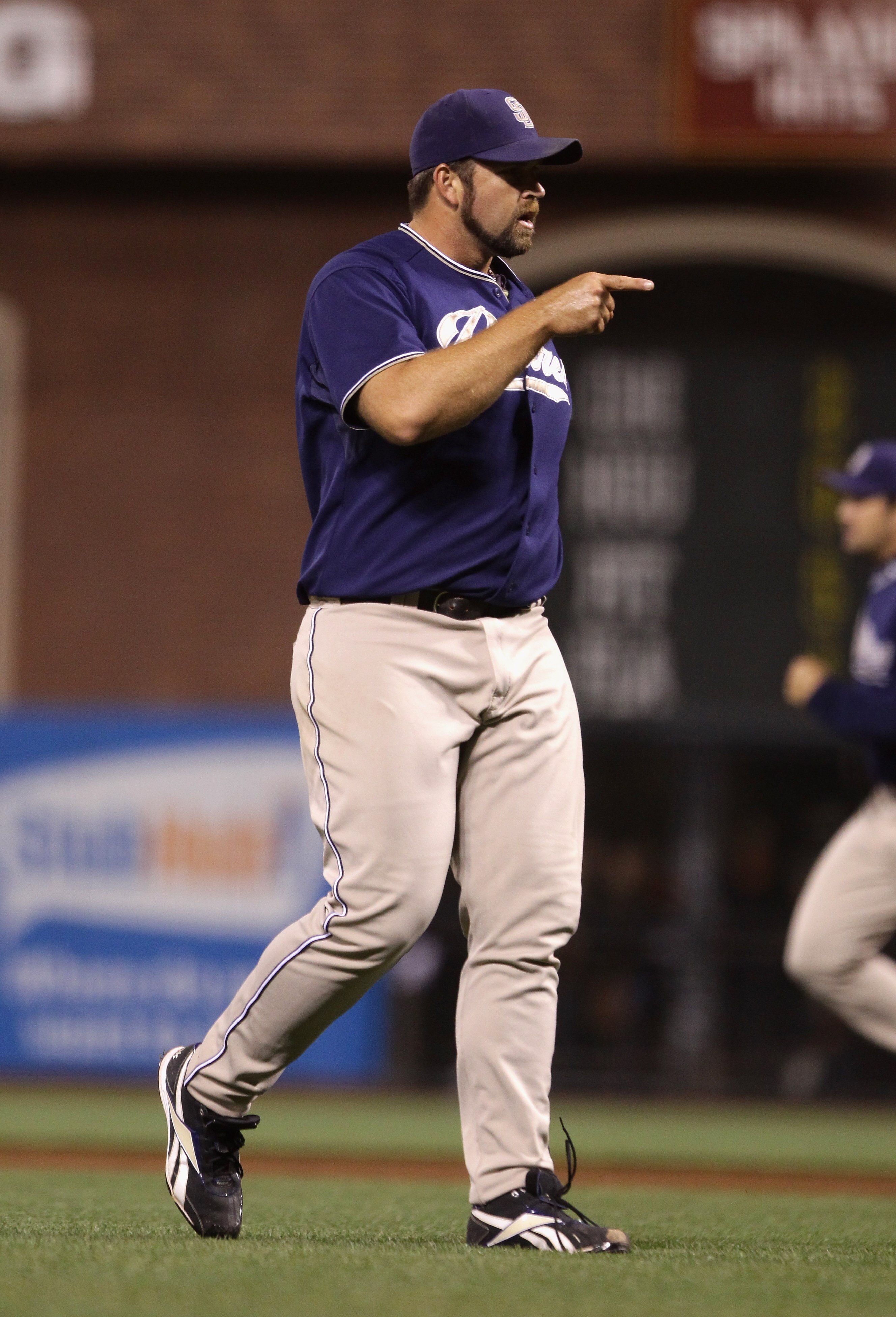 SAN FRANCISCO - OCTOBER 01:  Heath Bell #21 of the San Diego Padres celebrates after they beat the San Francisco Giants at AT&T Park on October 1, 2010 in San Francisco, California.  (Photo by Ezra Shaw/Getty Images)