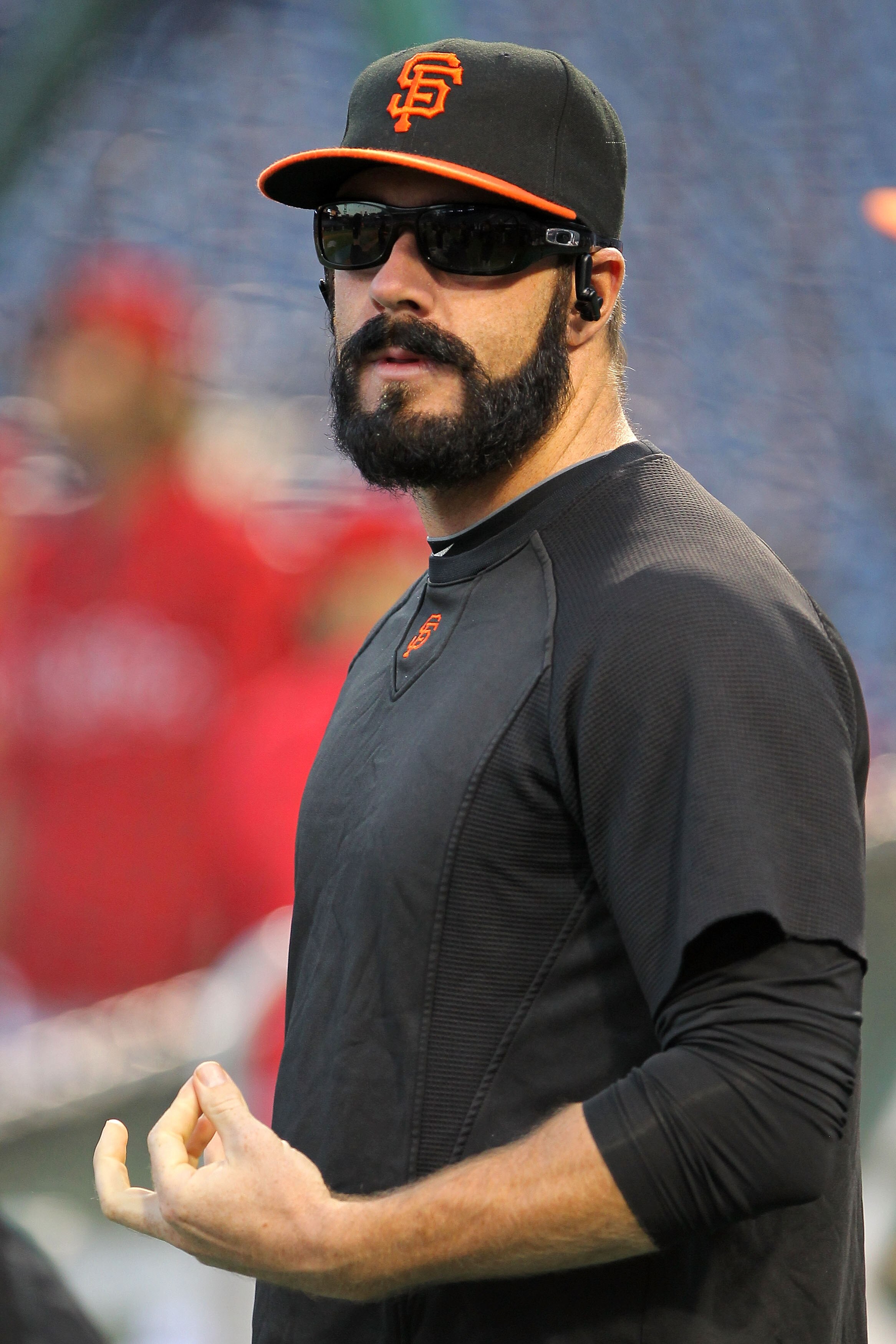 PHILADELPHIA - OCTOBER 23:  Brian Wilson #38 of the San Francisco Giants listens to music during batting practice before Game Six of the NLCS during the 2010 MLB Playoffs at Citizens Bank Park on October 23, 2010 in Philadelphia, Pennsylvania.  (Photo by