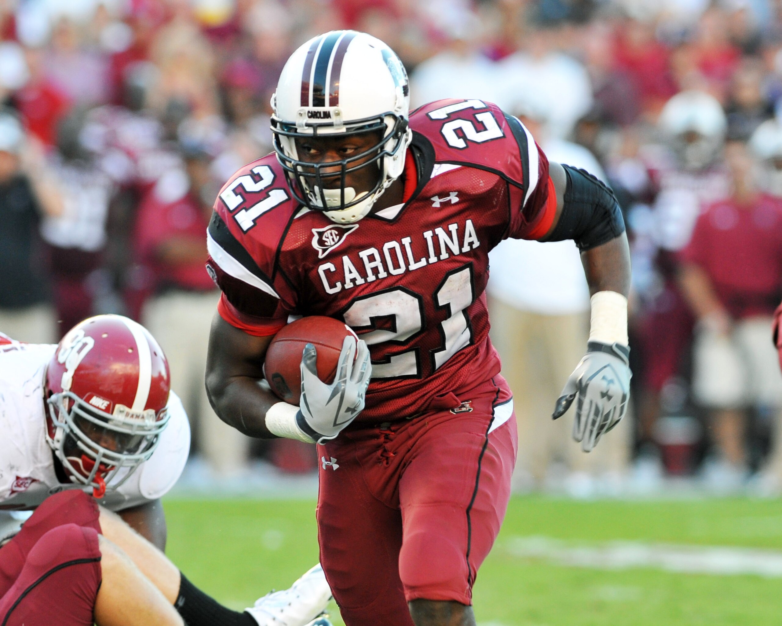 COLUMBIA, SC - OCTOBER 9: Running back Marcus Lattimore #21 of the South Carolina Gamecocks rushes upfield against the Alabama Crimson Tide October 9, 2010 at Williams-Brice Stadium in Columbia, South Carolina. (Photo by Al Messerschmidt/Getty Images) COLUMBIA, SC - OCTOBER 9: Running back Marcus Lattimore #21 of the South Carolina Gamecocks rushes upfield against the Alabama Crimson Tide October 9, 2010 at Williams-Brice Stadium in Columbia, South Carolina. (Photo by Al Messerschmidt/Getty Images)