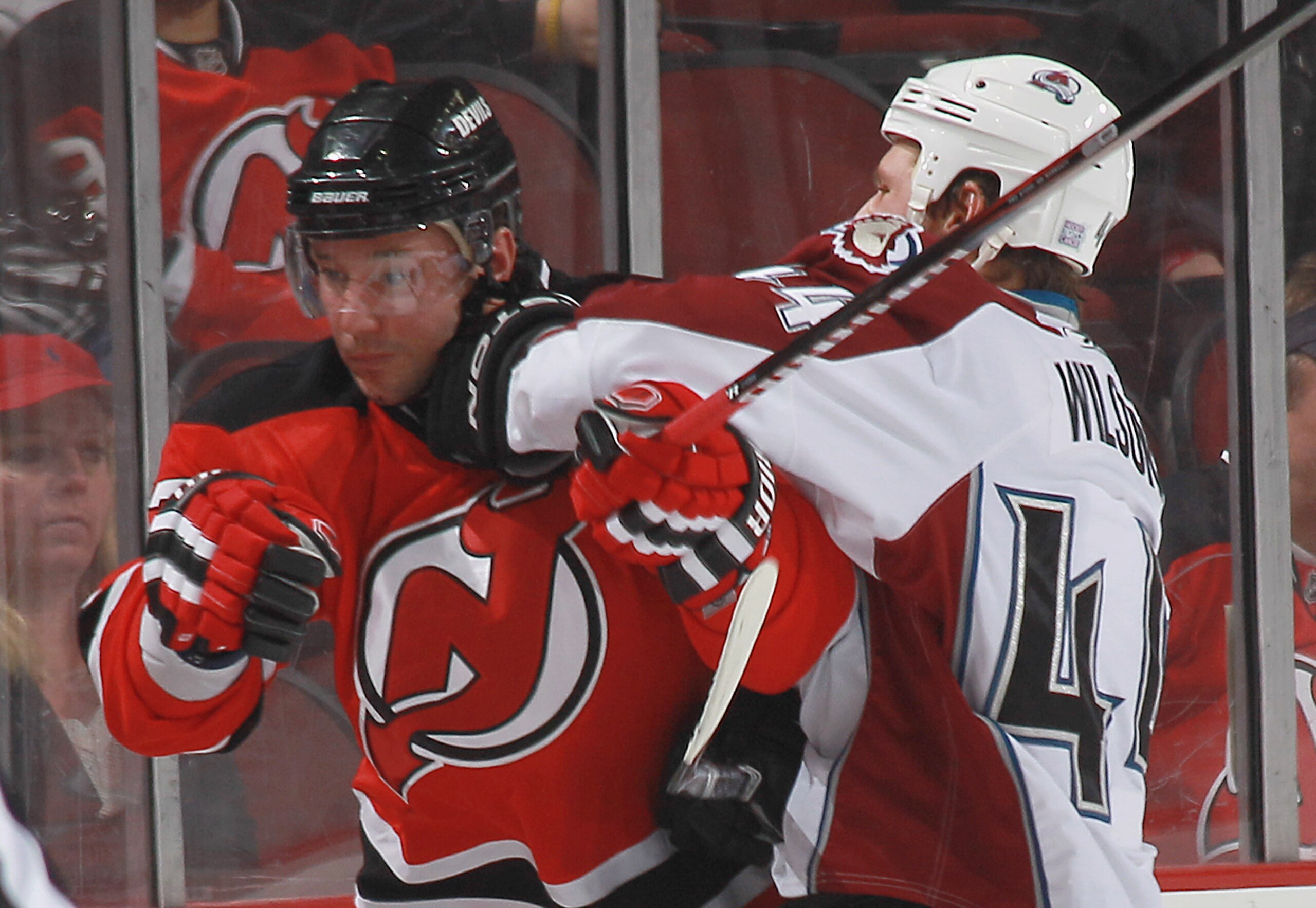 NEWARK, NJ - OCTOBER 15: Ilya Kovalchuk #17 of the New Jersey Devils gets an elbow from Ryan Wilson #44 of the Colorado Avalanche at the Prudential Center on October 15, 2010 in Newark, New Jersey.  (Photo by Bruce Bennett/Getty Images)