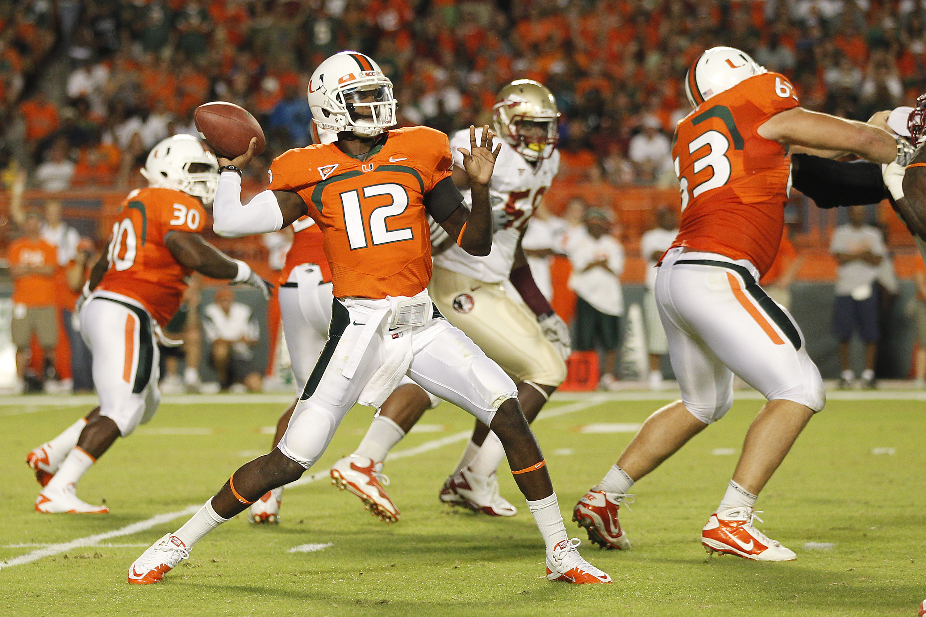 MIAMI, FL - OCTOBER 9: Jacory Harris #12 of the Miami Hurricanes hrows the ball against the Florida State Seminoles on October 9, 2010 at Sun Life Stadium in Miami, Florida. (Photo by Joel Auerbach/Getty Images) MIAMI, FL - OCTOBER 9: Jacory Harris #12 of the Miami Hurricanes hrows the ball against the Florida State Seminoles on October 9, 2010 at Sun Life Stadium in Miami, Florida. (Photo by Joel Auerbach/Getty Images)