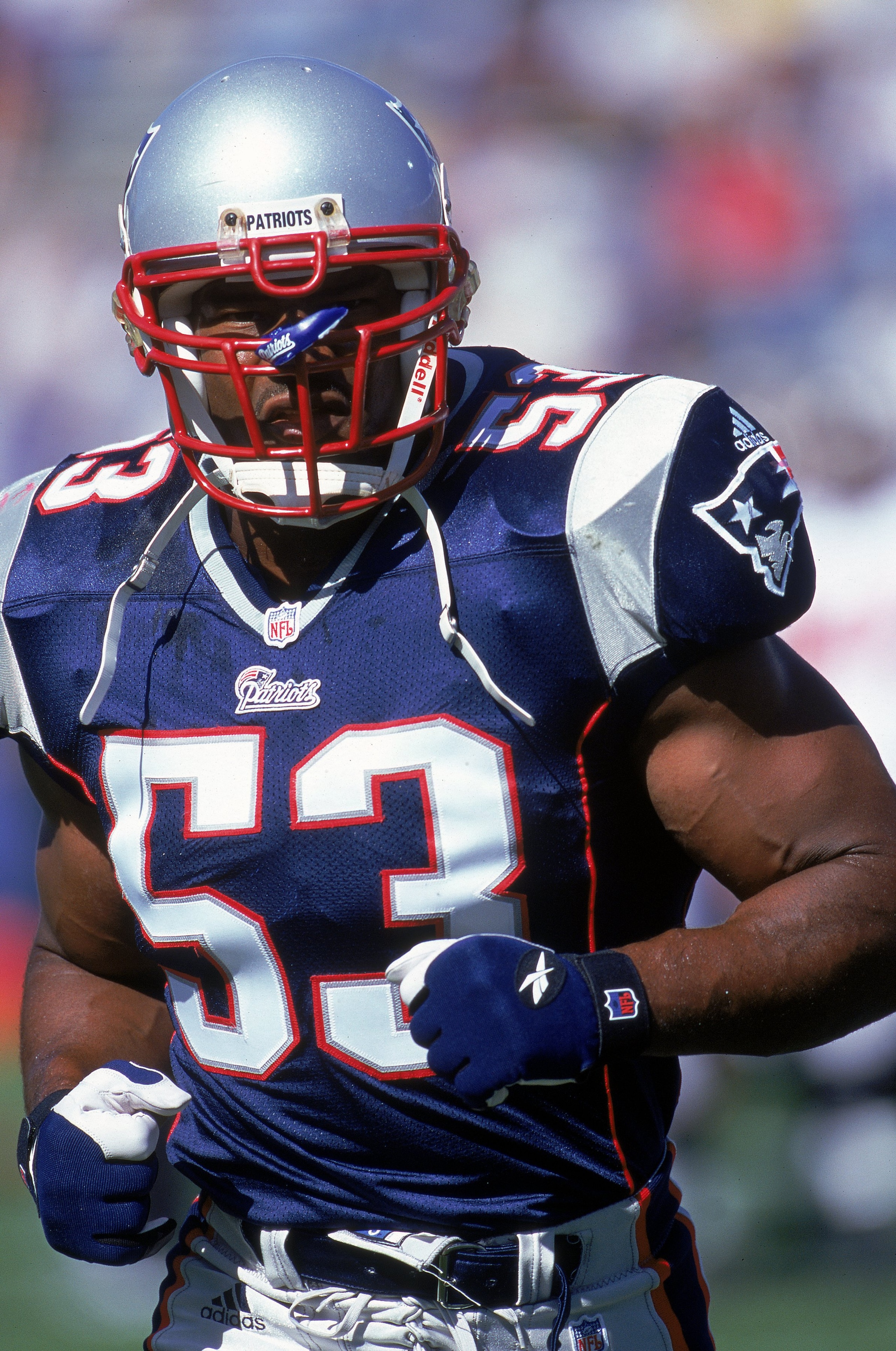 20 Aug 2000:  Chris Slade #53 of the New England Patriots jogs on the field during the game against the Tampa Bay Buccaneers at the Foxboro Stadium in Foxboro, Massachusetts. The Buccaneers defeated the Patriots 31-21.Mandatory Credit: Rick Stewart  /Alls