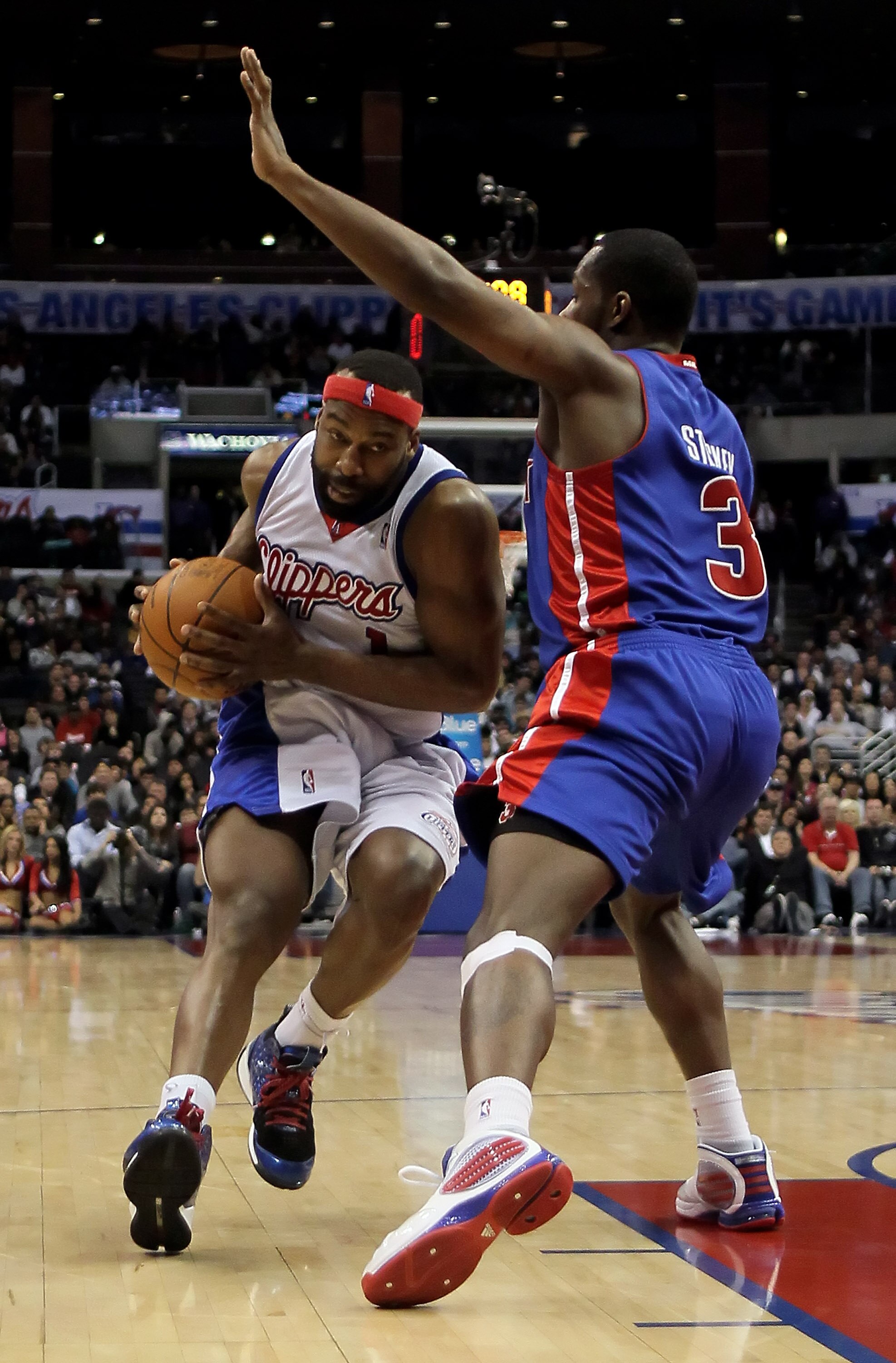 LOS ANGELES, CA - FEBRUARY 24:  Baron Davis #1 of the Los Angeles Clippers is defended by Rodney Stuckey #3 of the Detroit Pistons in the second half at Staples Center on February 24, 2010 in Los Angeles, California. The Clippers defeated the Pistons 97-9