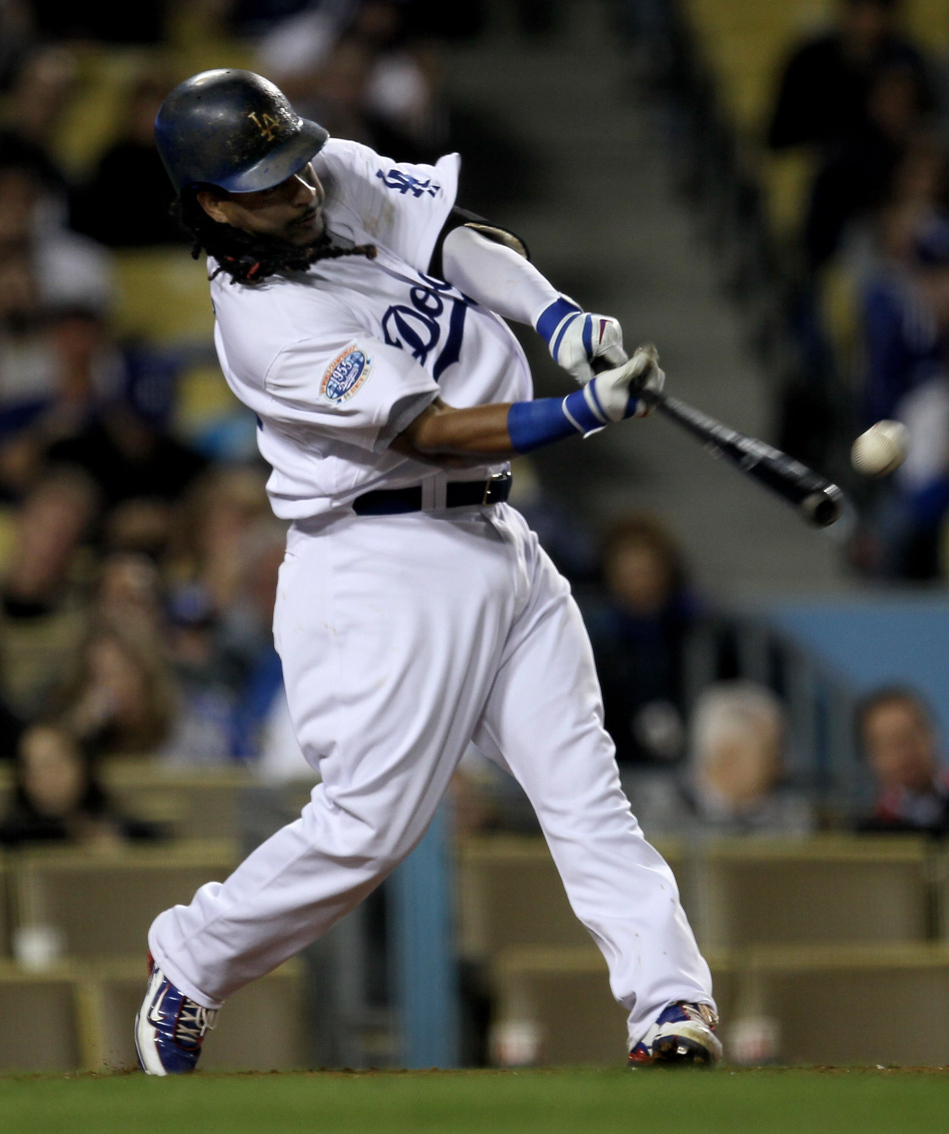 LOS ANGELES - MAY 8: Manny Ramirez #99 of the Los Angeles Dodgers singles in the eighth inning against the Colorado Rockies in his first game since coming off the disabled list on May 8, 2010 at Dodger Stadium in Los Angeles, California.  (Photo by Stephe