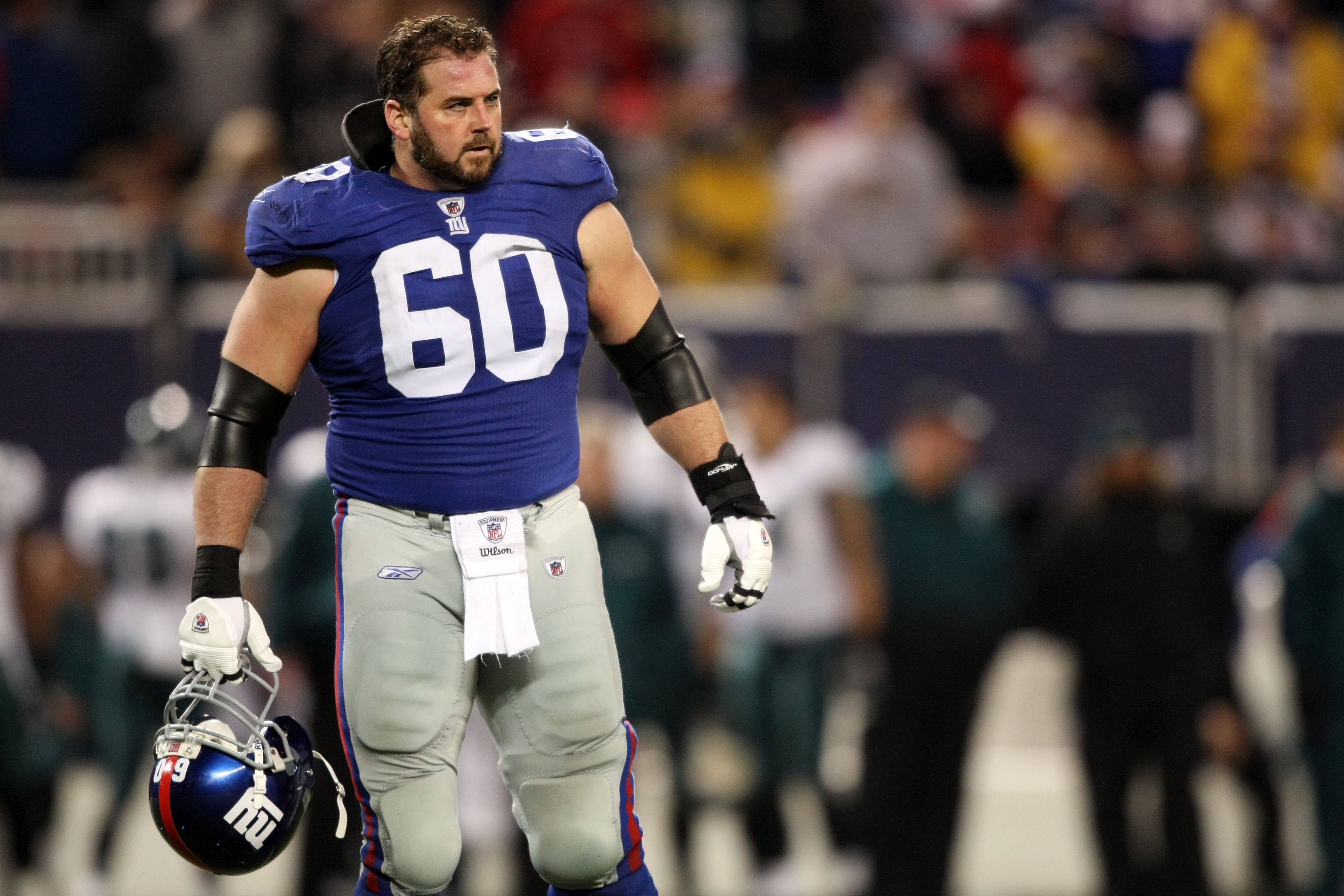 EAST RUTHERFORD, NJ - DECEMBER 13:  Shaun O'Hara #60 of the New York Giants looks on against  the Philadelphia Eagles at Giants Stadium on December 13, 2009 in East Rutherford, New Jersey.  (Photo by Nick Laham/Getty Images)
