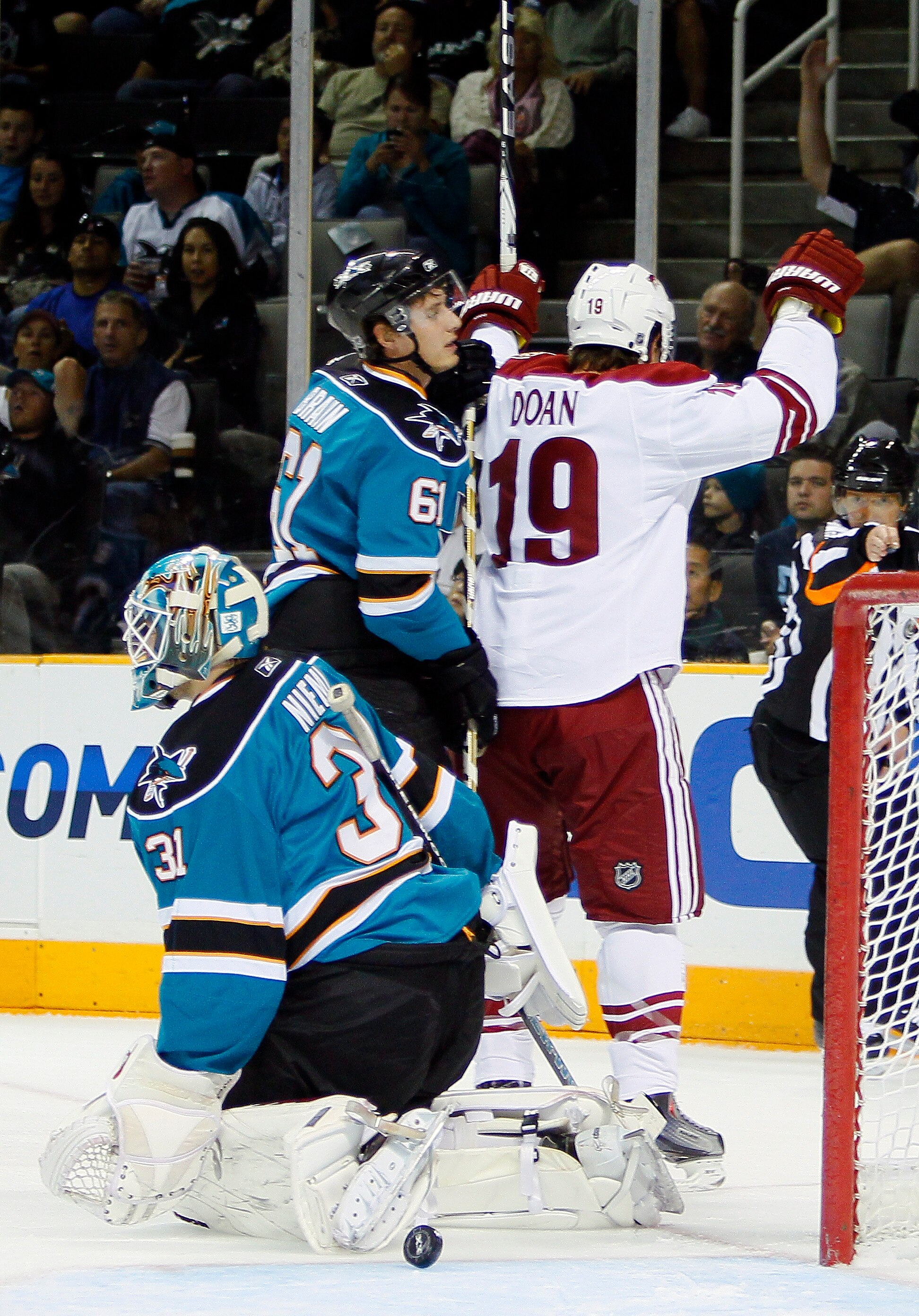 SAN JOSE, CA - SEPTEMBER 25:  Shane Doan #19 of the Phoenix Coyotes celebrates his goal against goalie Antti Niemi #31 of the San Jose Sharks in the first period of a preseason split-squad game at HP Pavilion on September 25, 2010 in San Jose, California.