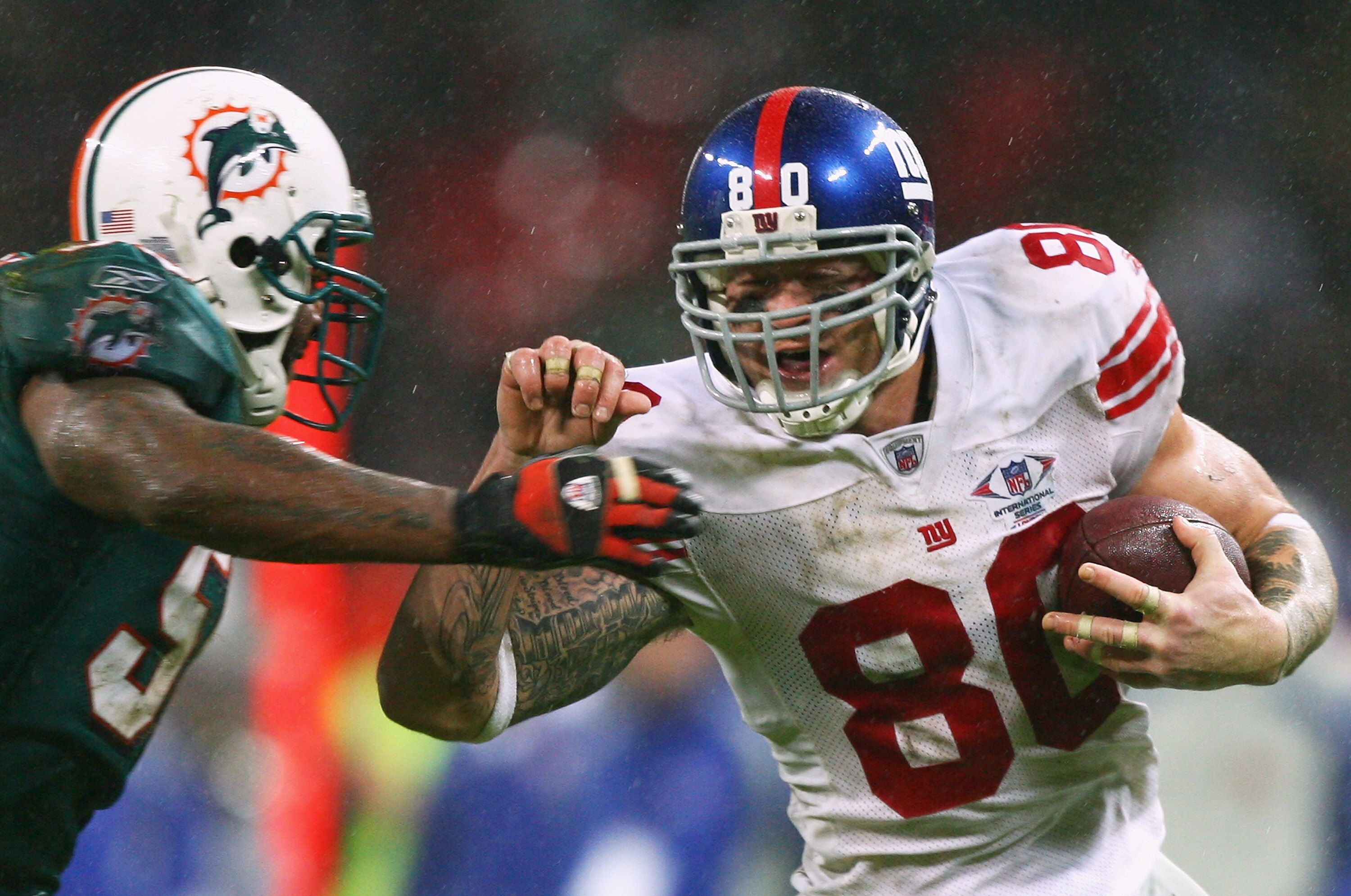 LONDON - OCTOBER 28:  Giants Tight End, Jeremy Shockey #80 carries the ball during the NFL Bridgestone International Series match between New York Giants and  Miami Dolphins at Wembley Stadium on October 28, 2007 in London, England. This is the first ever