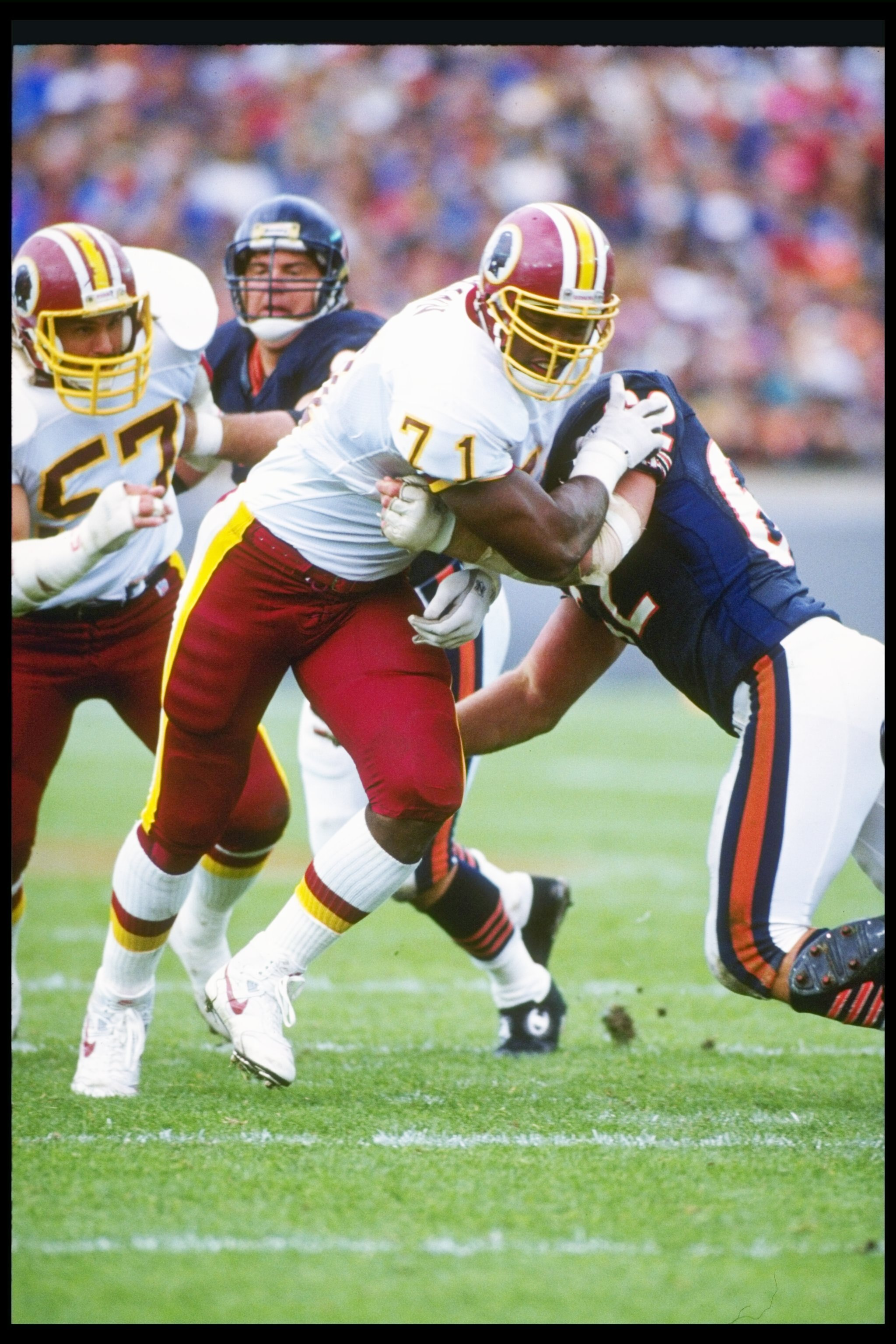 6 Oct 1991:  Defensive lineman Charles Mann of the Washington Redskins works against a Chicago Bears player during a game at Soldier Field in Chicago, Illinois.  The Redskins won the game, 20-7. Mandatory Credit: Jonathan Daniel  /Allsport
