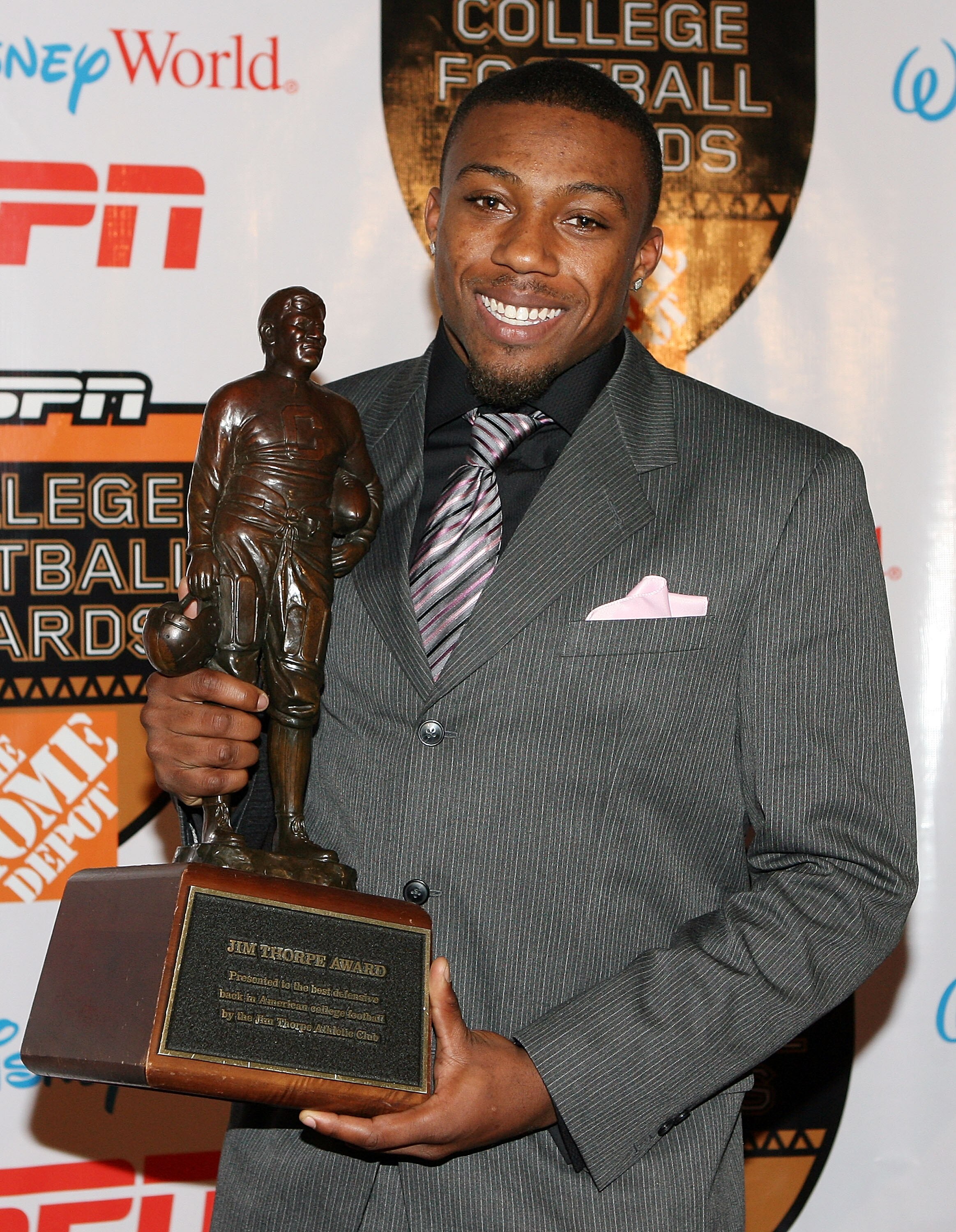LAKE BUENA VISTA, FL - DECEMBER 10:  Defensive back Eric Berry of the Tennessee Volunteers poses with the Jim Thorpe Award trophy during the Home Depot ESPNU College Football Awards at the Disney Boardwalk on December 10, 2009 in Lake Buena Vista, Florida