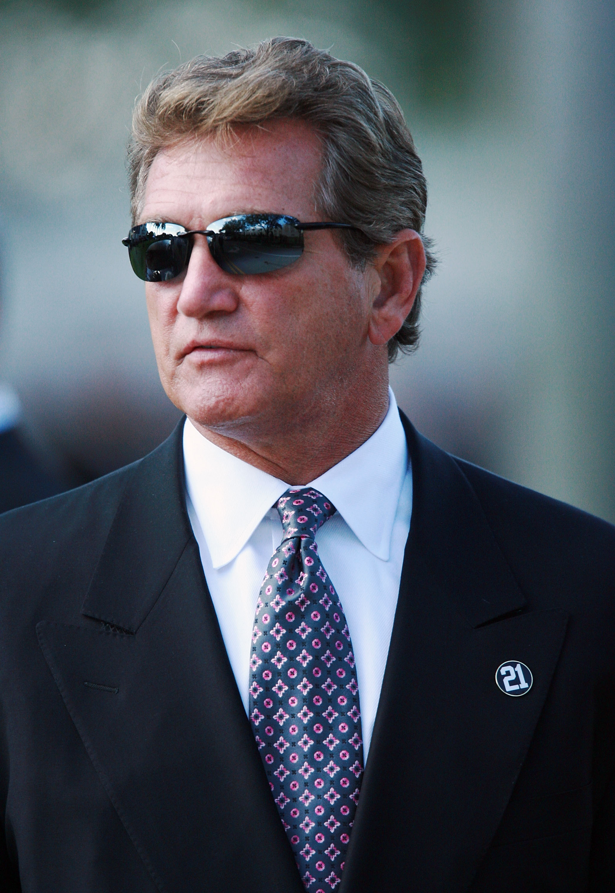 MIAMI - DECEMBER 03:  College Football Hall of Famer Joe Theisman leaves after funeral services for Sean Taylor of the Washington Redskins at Pharmed Arena on December 3, 2007 in Miami, Florida. Taylor died November 27, one day after being shot at his hom