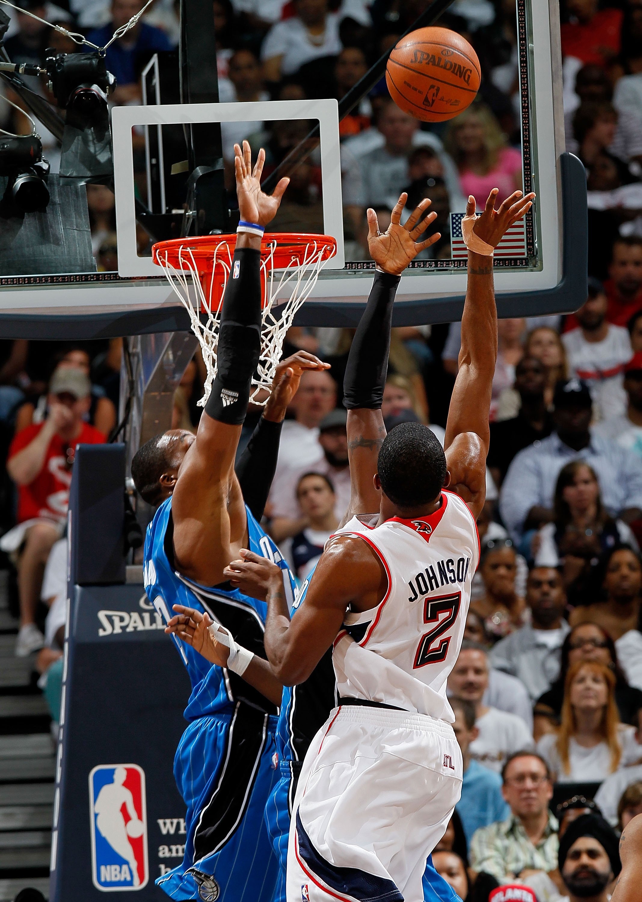 ATLANTA - MAY 08:  Dwight Howard #12 of the Orlando Magic and Joe Johnson #2 of the Atlanta Hawks during Game Three of the Eastern Conference Semifinals during the 2010 NBA Playoffs at Philips Arena on May 8, 2010 in Atlanta, Georgia.  NOTE TO USER: User 