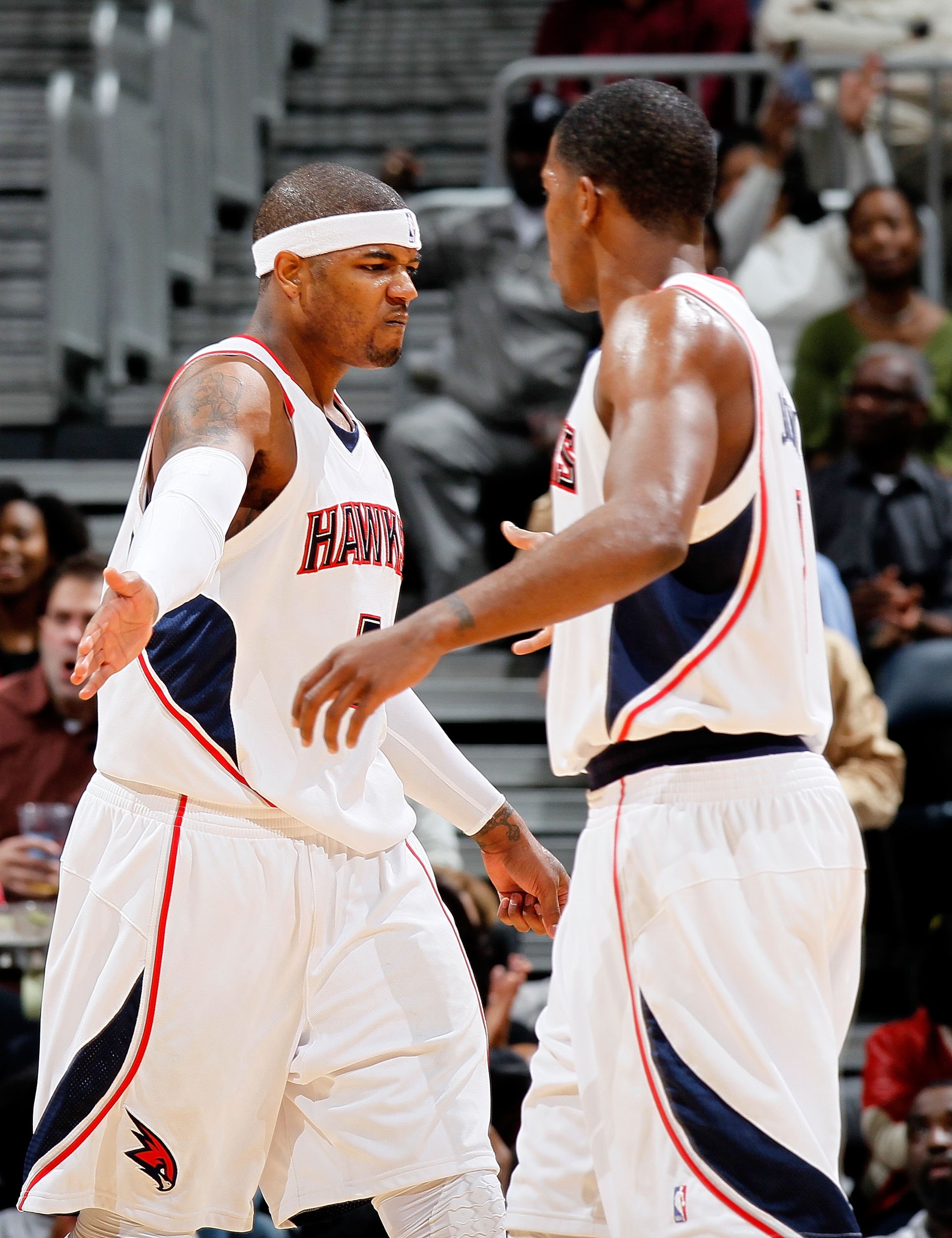 ATLANTA - JANUARY 29:  Josh Smith #5 and Joe Johnson #2 of the Atlanta Hawks against the Boston Celtics at Philips Arena on January 29, 2010 in Atlanta, Georgia.  NOTE TO USER: User expressly acknowledges and agrees that, by downloading and/or using this