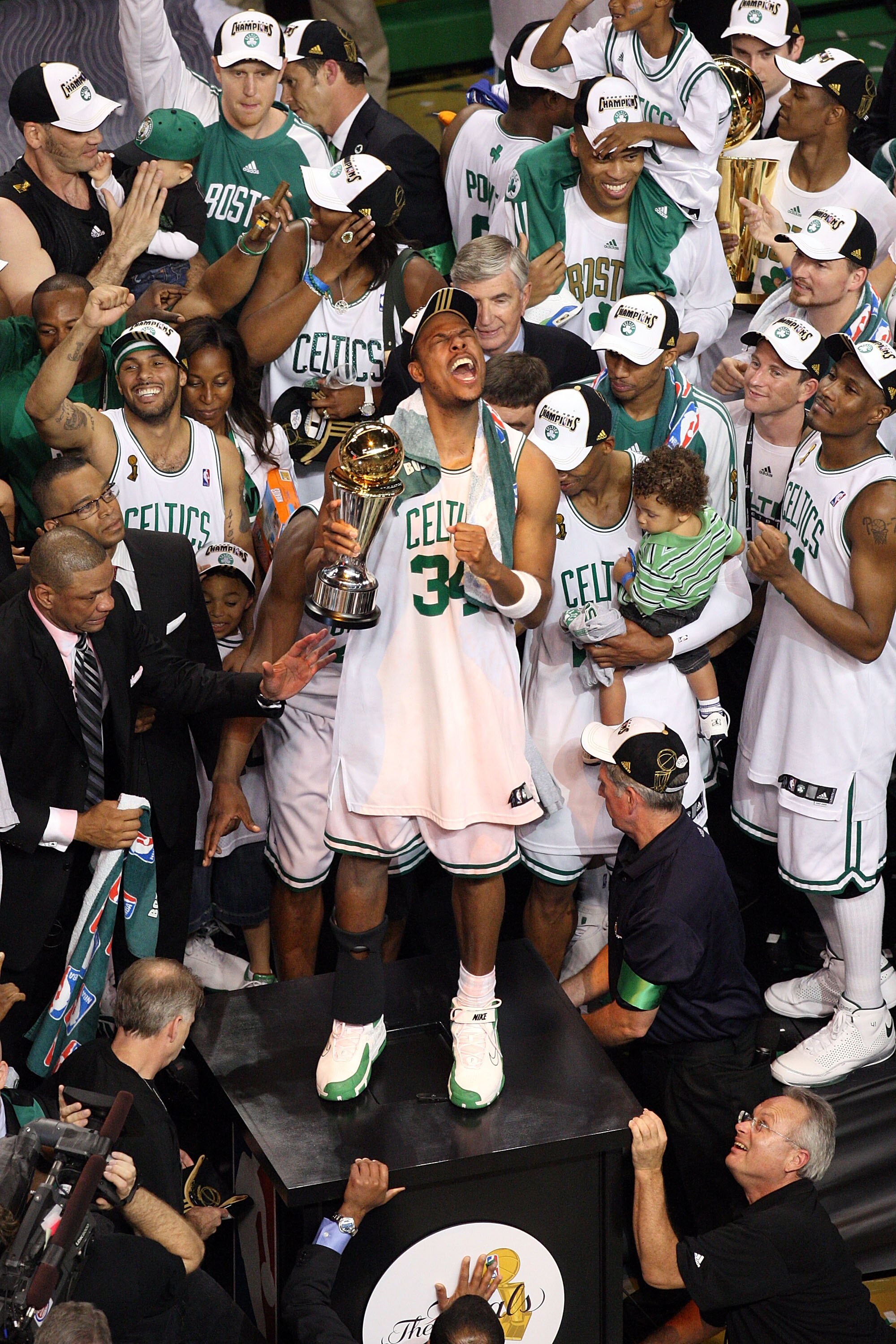 BOSTON - JUNE 17:  Paul Pierce #34 of the Boston Celtics celebrates with the NBA Finals MVP trophy after defeating the Los Angeles Lakers in Game Six of the 2008 NBA Finals on June 17, 2008 at TD Banknorth Garden in Boston, Massachusetts. NOTE TO USER: Us