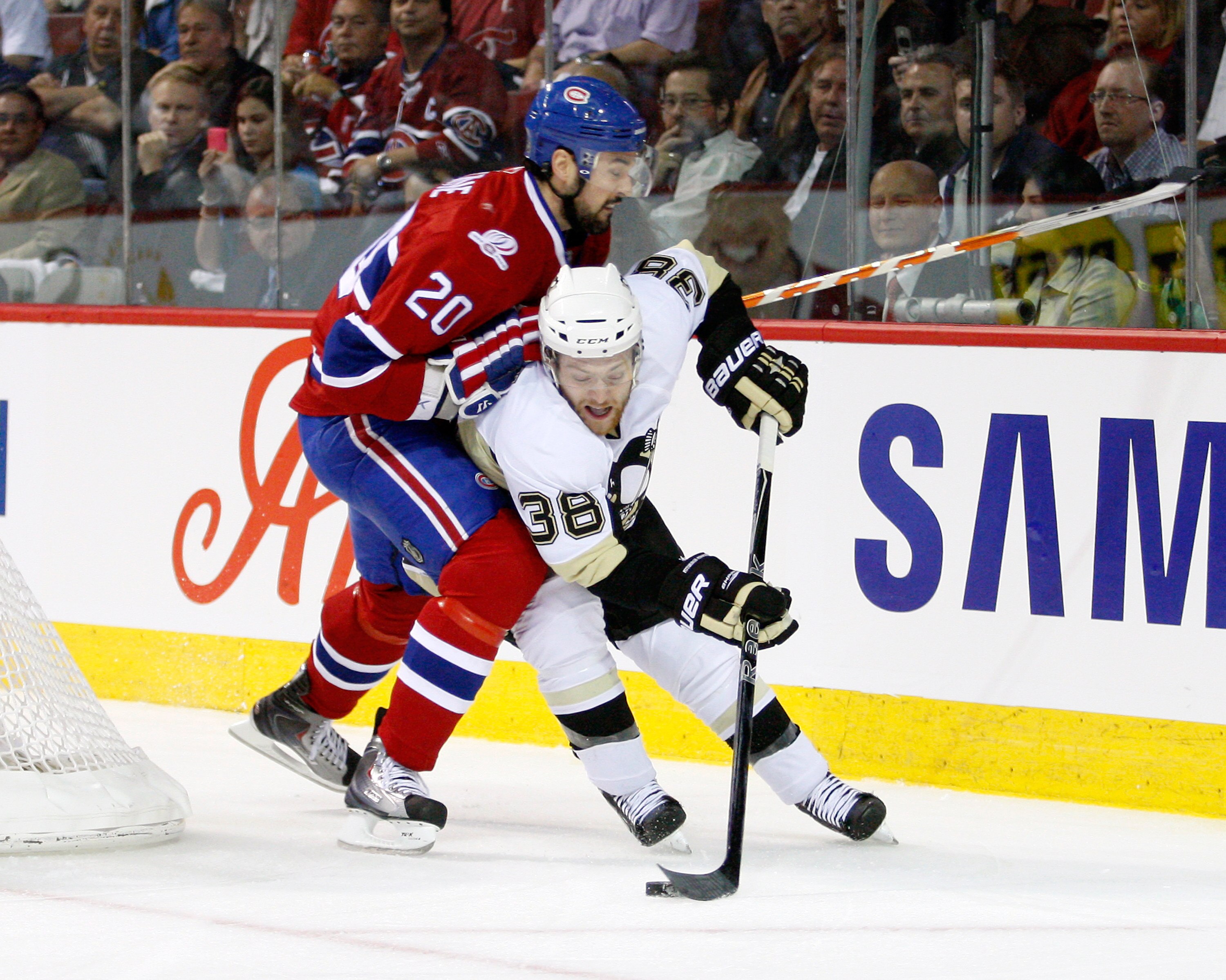 MONTREAL- MAY 4:  Mark Letestu #38 of the Pittsburgh Penguins skates with the puck while being defended by Ryan O'Byrne #20 of the Montreal Canadiens in Game Three of the Eastern Conference Semifinals during the 2010 NHL Stanley Cup Playoffs at the Bell C