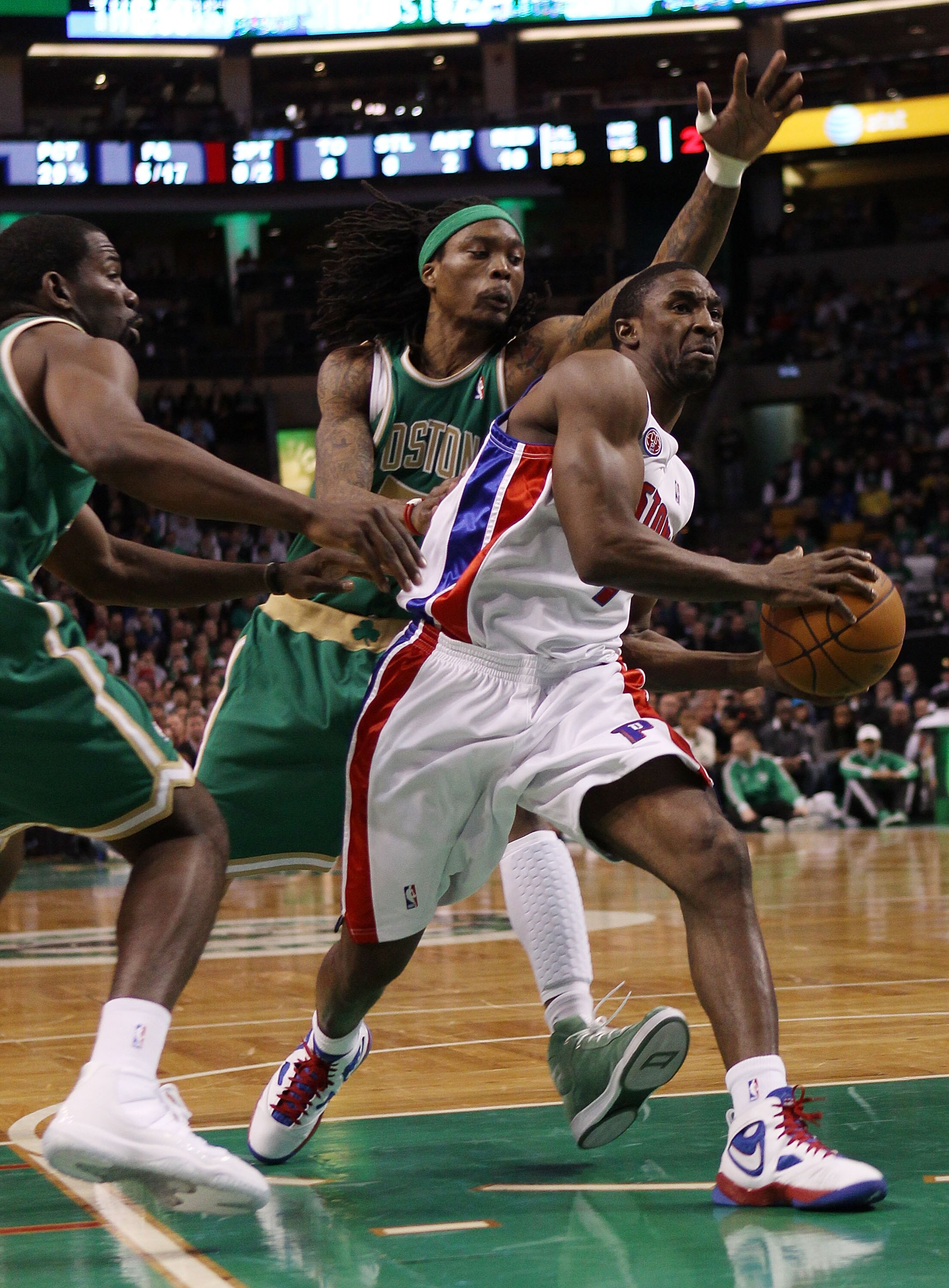 BOSTON - MARCH 15:  Ben Gordon #7 of the Detroit Pistons heads for the net as Marquis Daniels #7 and Michael Finley #40 of the Boston Celtics defend on March 15, 2010 at the TD Garden in Boston, Massachusetts.  NOTE TO USER: User expressly acknowledges an