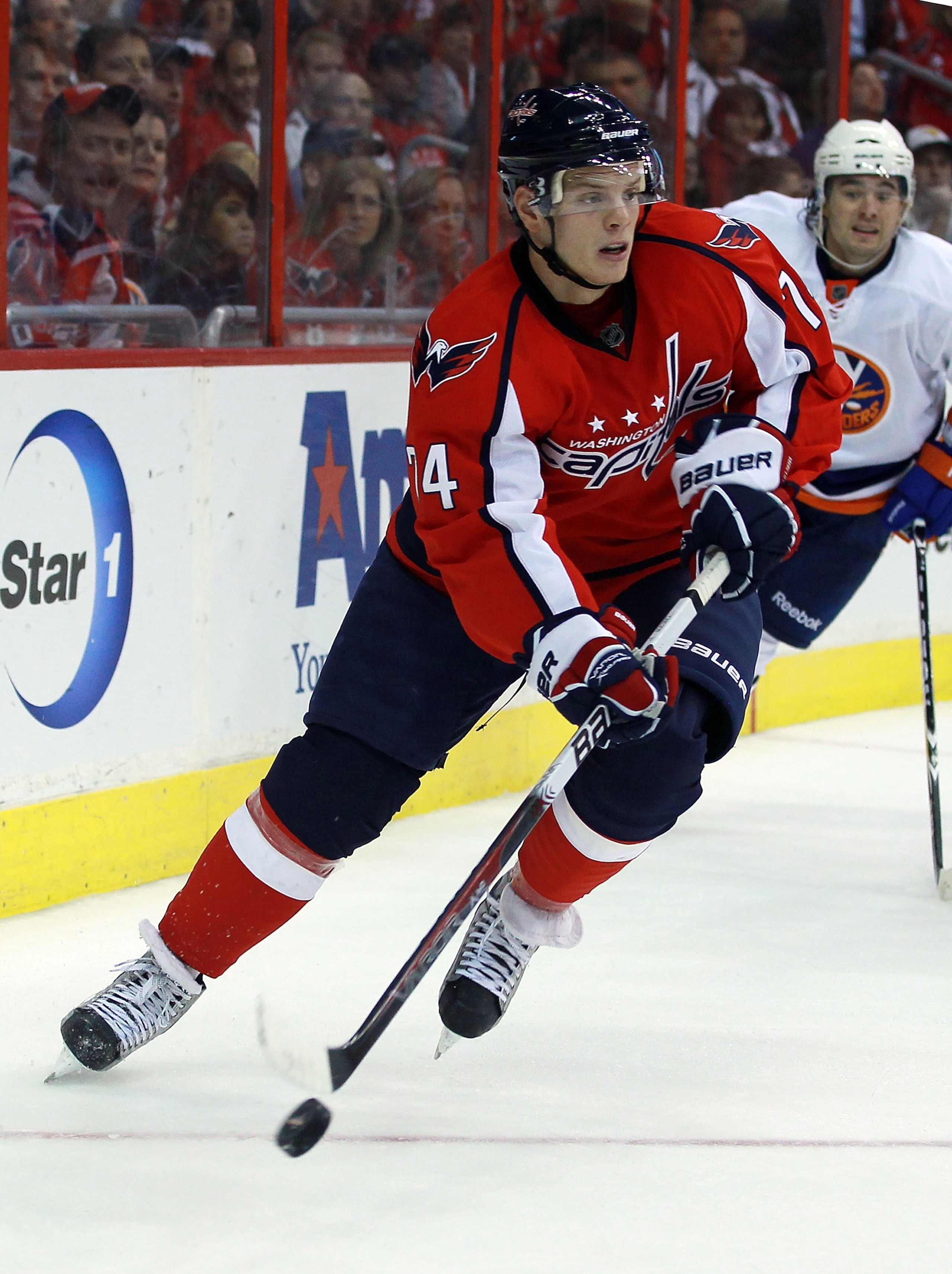 WASHINGTON - OCTOBER 13: John Carlson #74 of the Washington Capitals skates against the New York Islanders at the Verizon Center on October 13, 2010 in Washington, DC.  (Photo by Bruce Bennett/Getty Images)