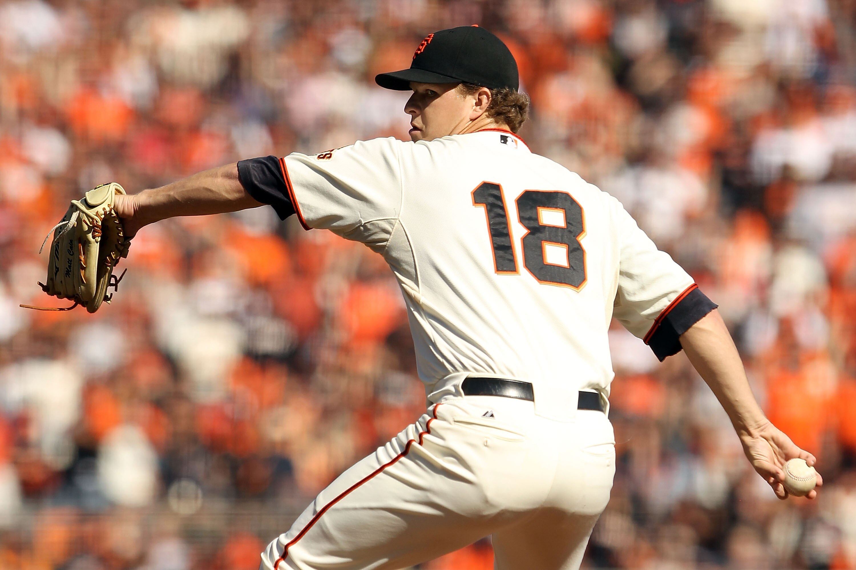 SAN FRANCISCO - OCTOBER 19:  Matt Cain #18 of the San Francisco Giants pitches against the Philadelphia Phillies in Game Three of the NLCS during the 2010 MLB Playoffs at AT&T Park on October 19, 2010 in San Francisco, California.  (Photo by Ezra Shaw/Get