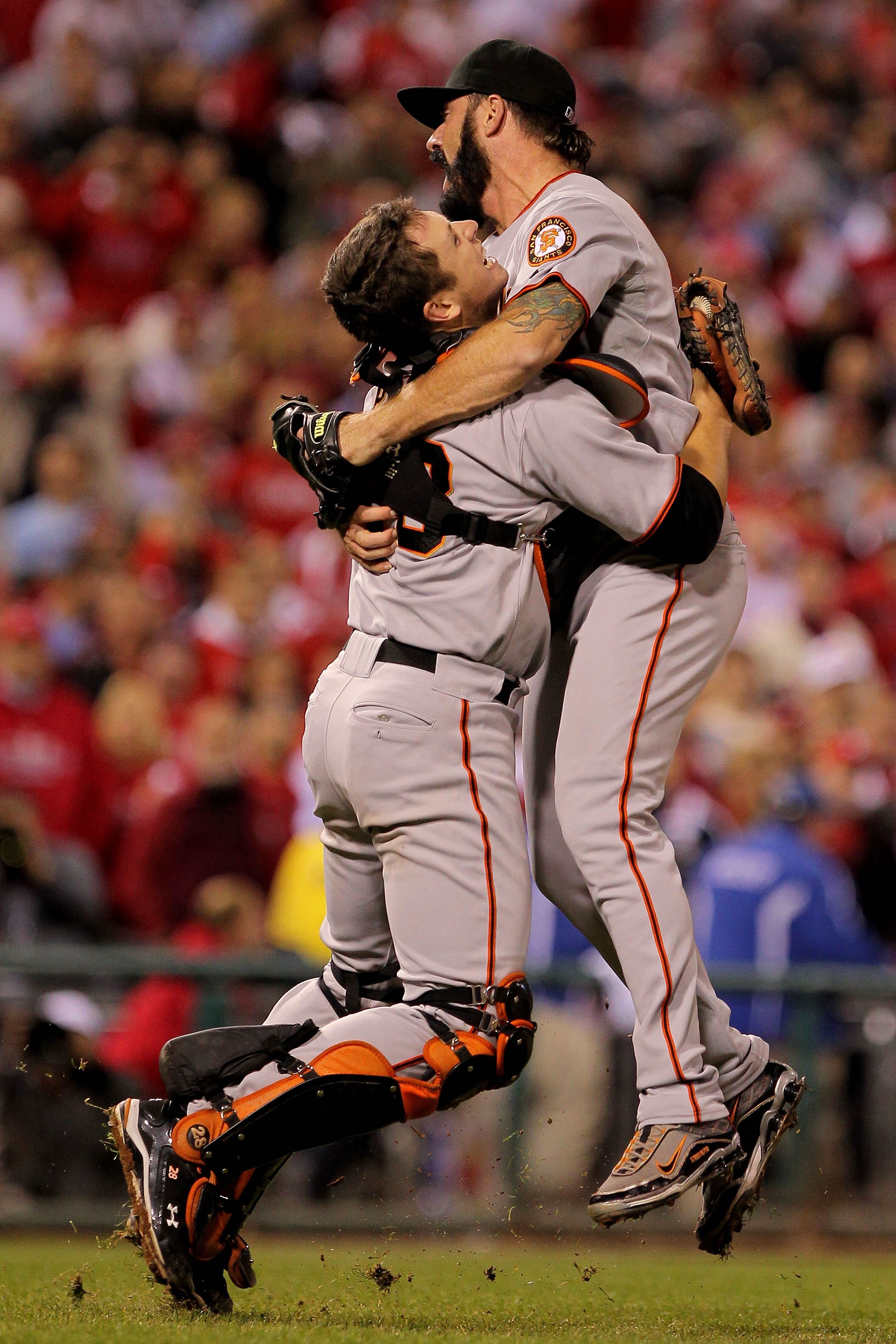 PHILADELPHIA - OCTOBER 23:  Buster Posey #28 and Brian Wilson #38 of the San Francisco Giants celebrate defeating the Philadelphia Phillies 3-2 and winning the pennant in Game Six of the NLCS during the 2010 MLB Playoffs at Citizens Bank Park on October 2