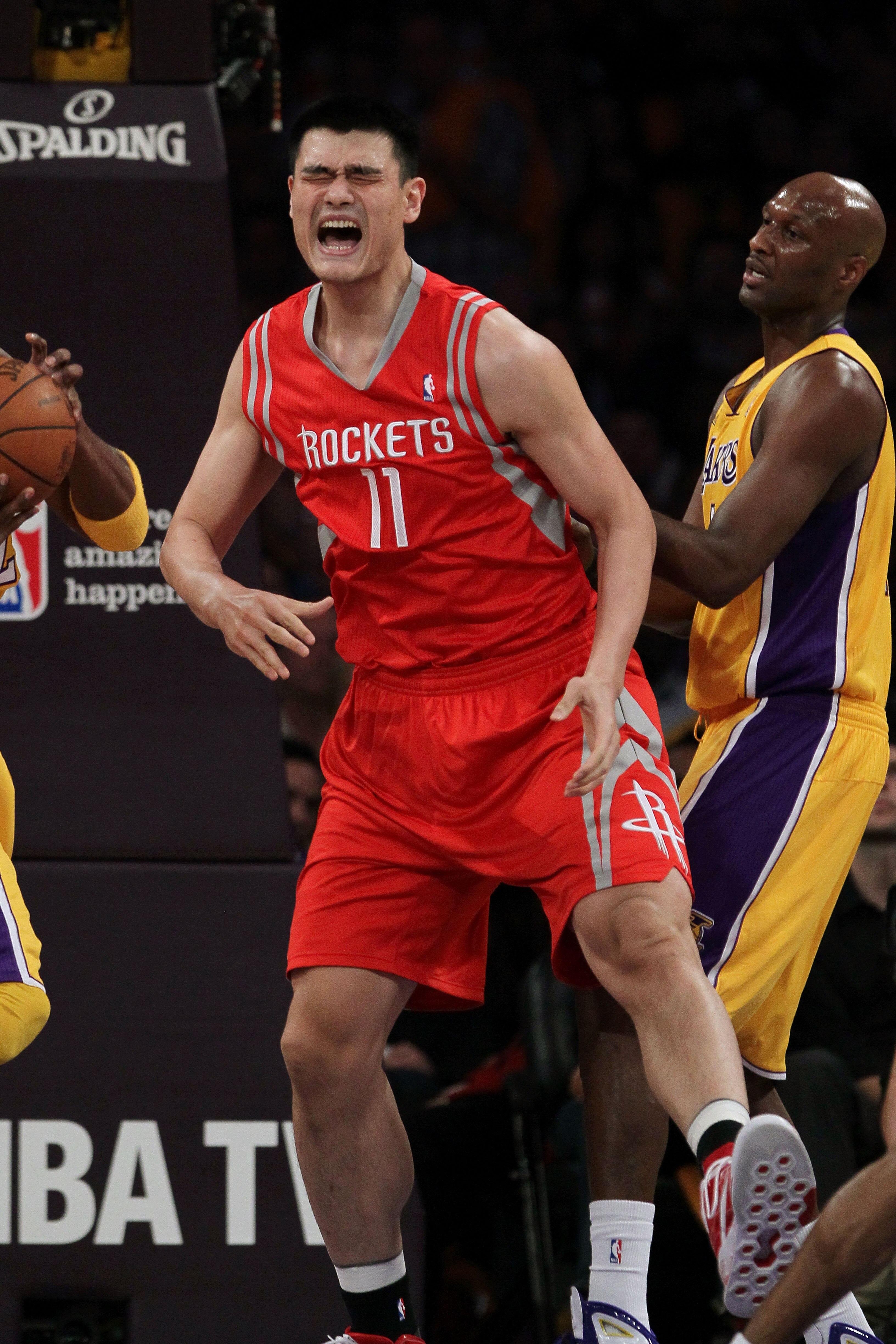 LOS ANGELES, CA - OCTOBER 26: Yao Ming #11 of the Houston Rockets reacts to a play during their opening night game against the Los Angeles Lakers at Staples Center on October 26, 2010 in Los Angeles, California. NOTE TO USER: User expressly acknowledges LOS ANGELES, CA - OCTOBER 26: Yao Ming #11 of the Houston Rockets reacts to a play during their opening night game against the Los Angeles Lakers at Staples Center on October 26, 2010 in Los Angeles, California. NOTE TO USER: User expressly acknowledges
