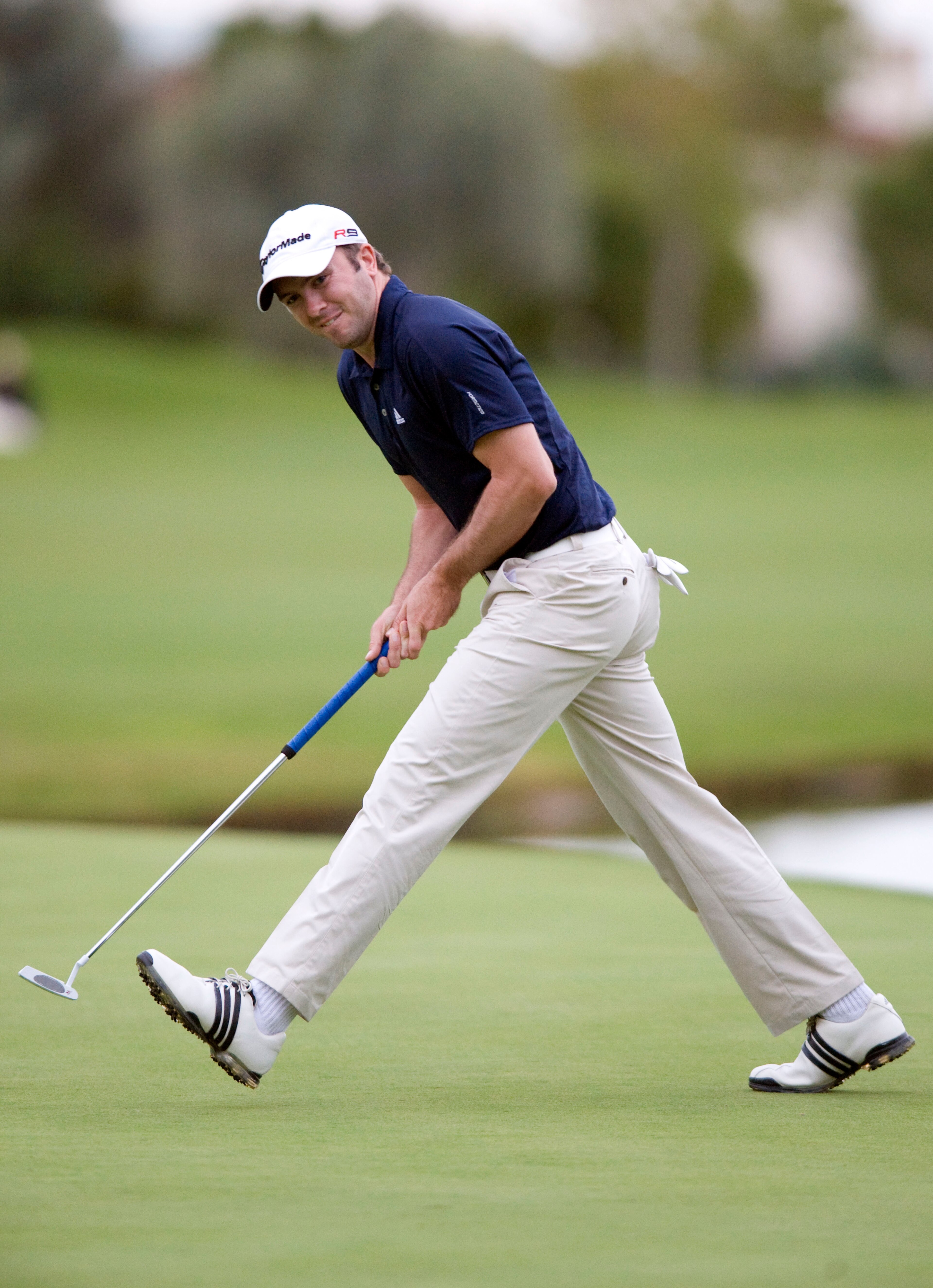 LAS VEGAS, NV - OCTOBER 24: Martin Laird reacts to missing a birdie putt on the 18th hole on the first hole of a playoff during the final round of the Justin Timberlake Shriners Hospitals for Children Open at TPC Sunderlin on October 24, 2010 in Las Vegas