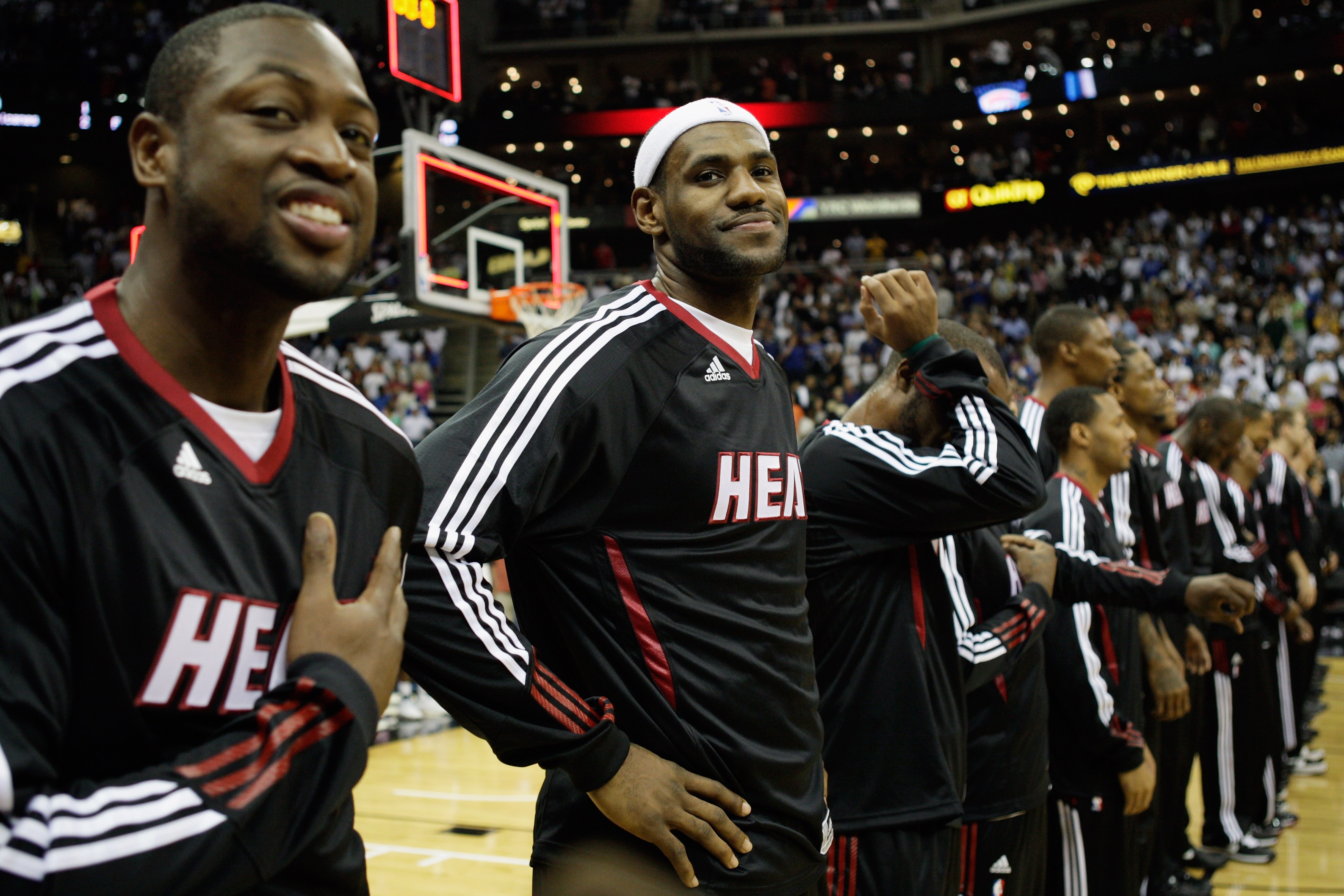 KANSAS CITY, MO - OCTOBER 08:  LeBron James #6 and Dwayne Wade #3 of the Miami Heat joke prior to the start of the game against the Oklahoma City Thunder on October 8, 2010 at the Sprint Center in Kansas City, Missouri.  (Photo by Jamie Squire/Getty Image
