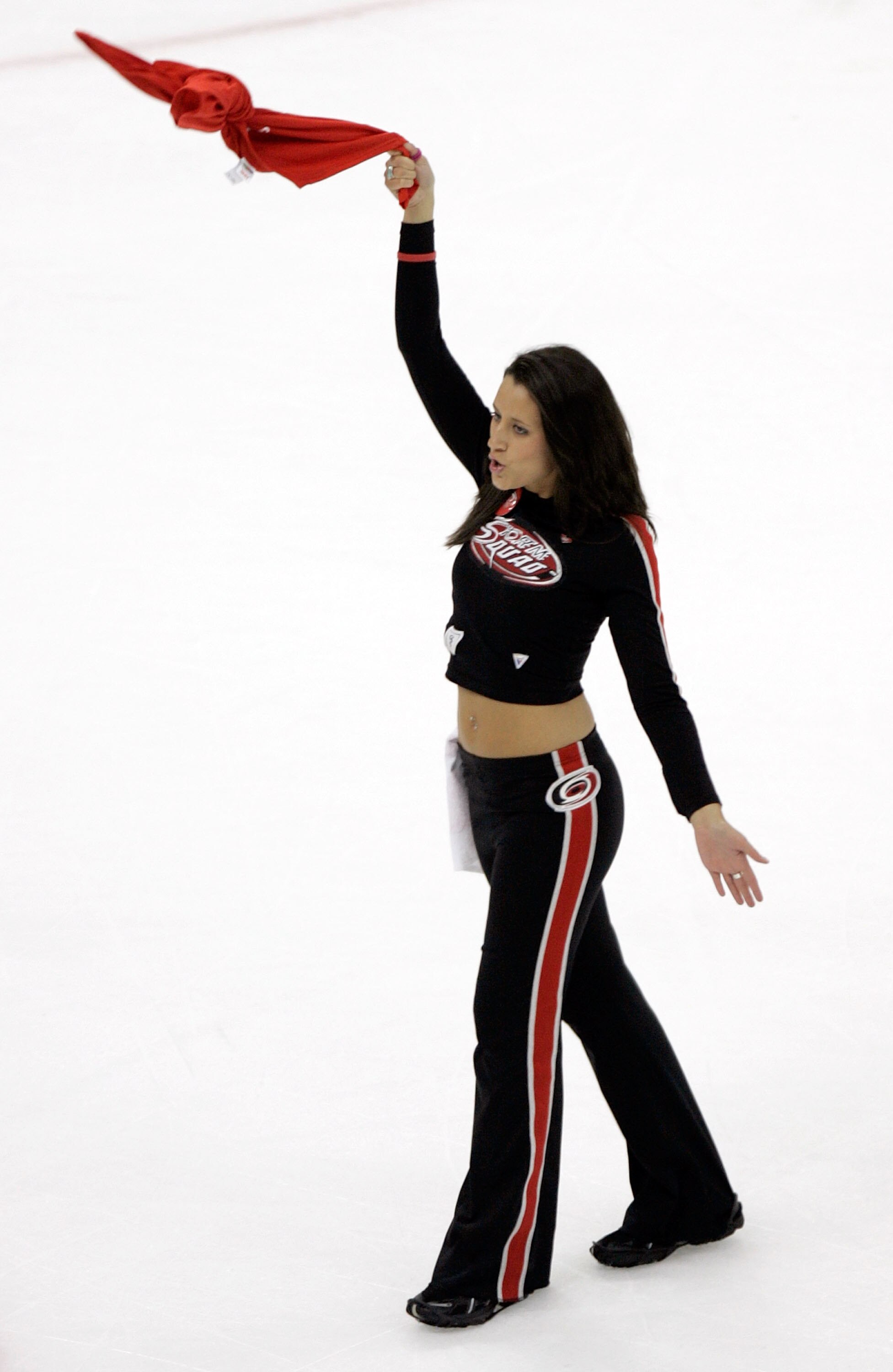 RALEIGH, NC - JUNE 07:  A Carolina Hurricanes cheerleader performs on the ice during game two of the 2006 NHL Stanley Cup Finals against the Edmonton Oilers during on June 7, 2006 at the RBC Center in Raleigh, North Carolina.  (Photo by Grant Halverson/Ge