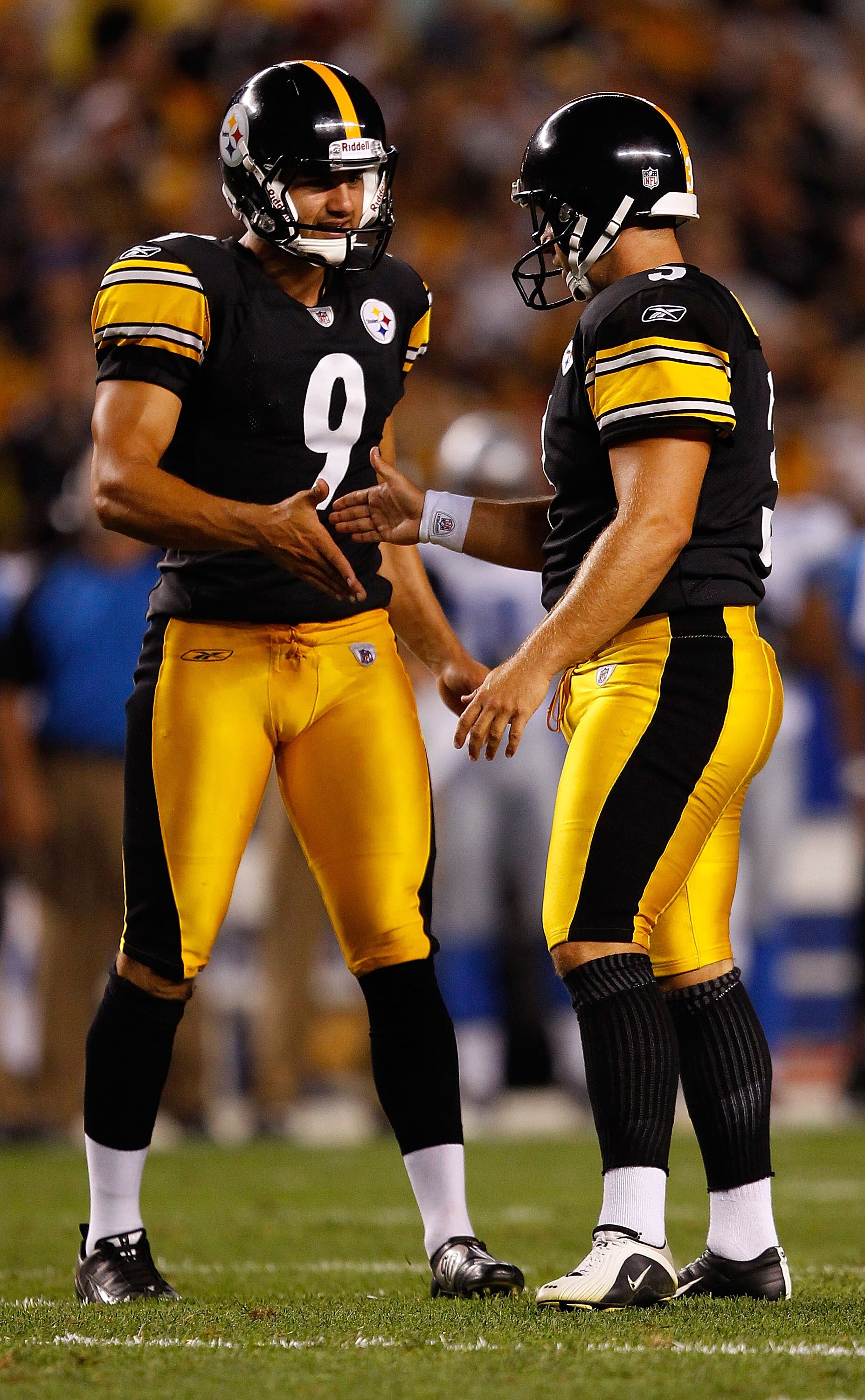 PITTSBURGH - AUGUST 14:  Daniel Sepulveda #9 of the Pittsburgh Steelers congratulates teammate Jeff Reed #3 after kicking a field goal against the Detroit Lions during the preseason game on August 14, 2010 at Heinz Field in Pittsburgh, Pennsylvania.  (Pho