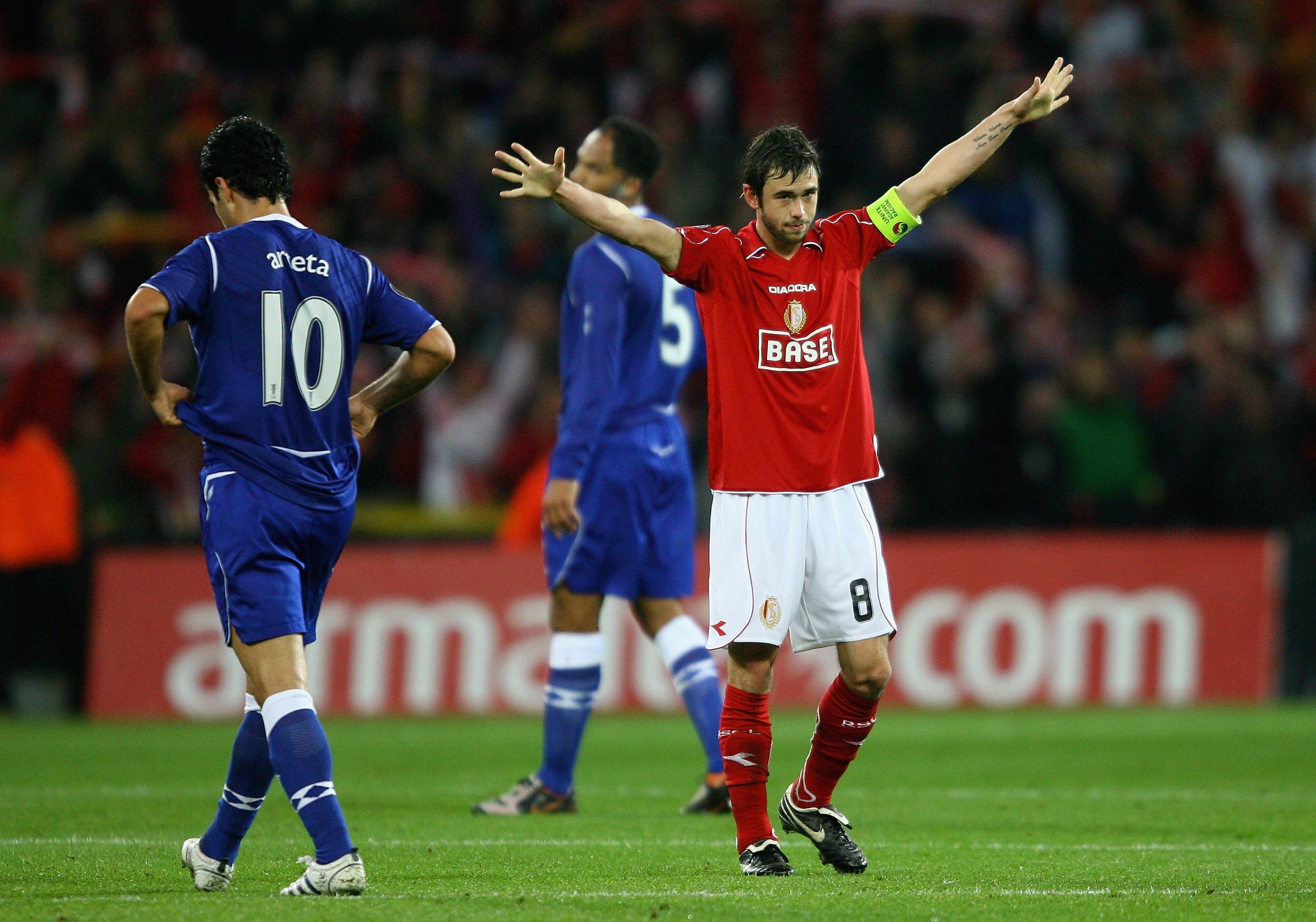 LIEGE, BELGIUM - OCTOBER 02: Steven Defour of Standard Liege celebrates on the final whistle after victory in the UEFA Cup first round, second leg match, between Standard Liege and Everton at Stade Maurice Dufrasne, on October 2, 2008 in Liege,Belgium.  (
