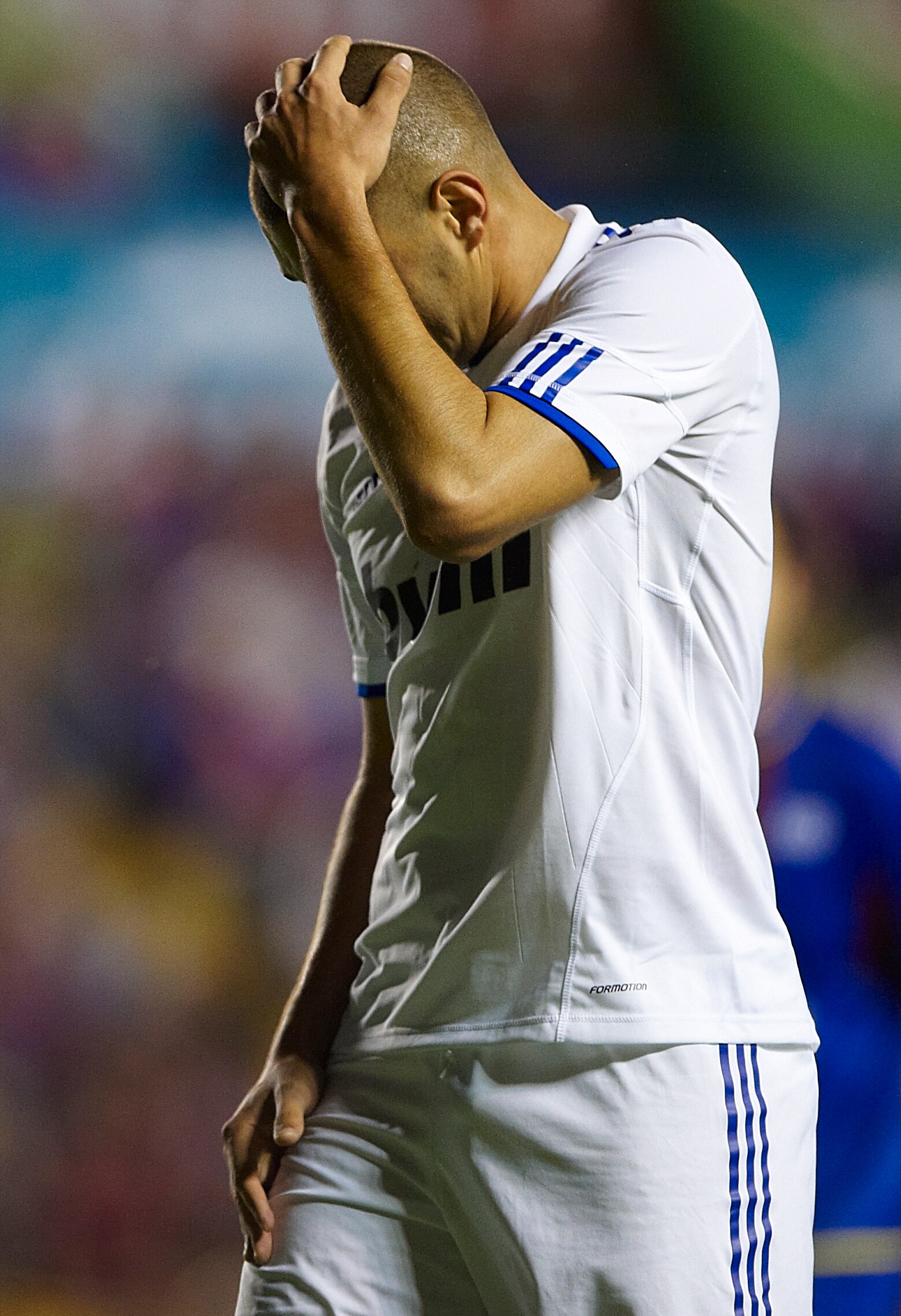 VALENCIA, SPAIN - SEPTEMBER 25:  Karim Benzema of Real Madrid reacts during the La Liga match between Levante UD and Real Madrid at Ciutat de Valencia on September 25, 2010 in Valencia, Spain.  (Photo by Manuel Queimadelos Alonso/Getty Images)