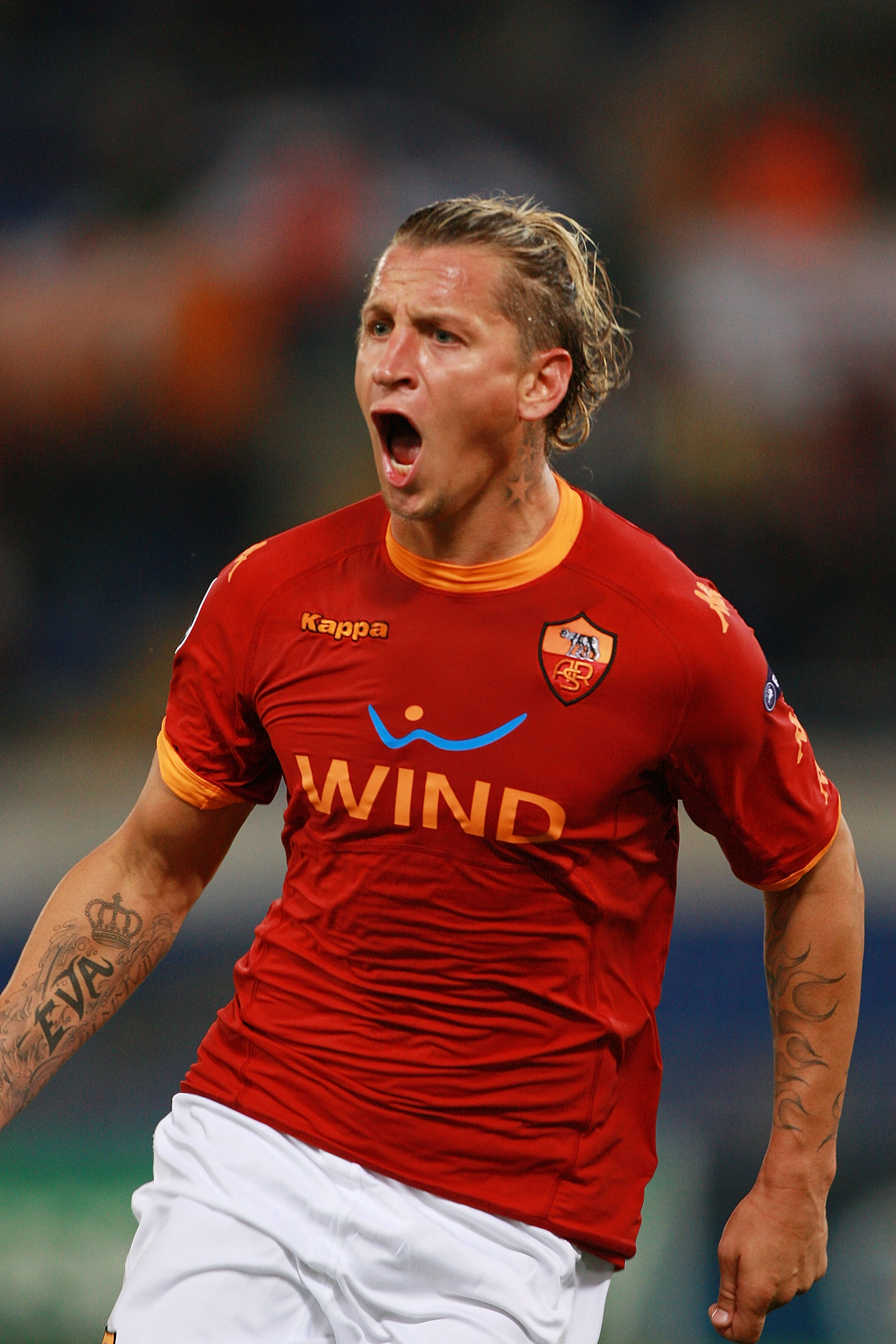 ROME - SEPTEMBER 28:  Philippe Mexes' of AS Roma celebrates after scoring the opening goal during the UEFA Champions League group E match between AS Roma and CFR Cluj at Stadio Olimpico on September 28, 2010 in Rome, Italy.  (Photo by Paolo Bruno/Getty Im