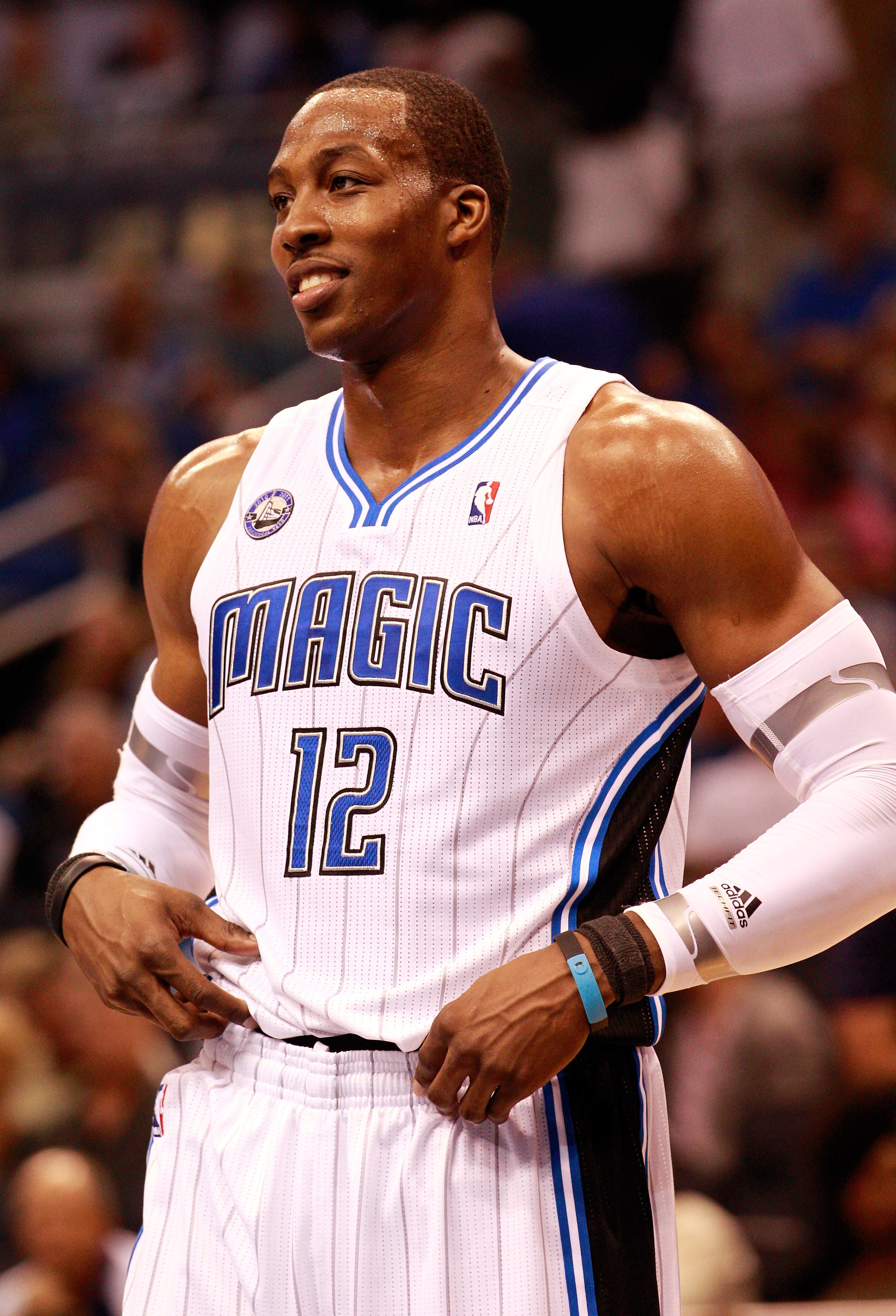 ORLANDO, FL - OCTOBER 10:  Dwight Howard #12 of the Orlando Magic smiles during the game against the New Orleans Hornets at Amway Arena on October 10, 2010 in Orlando, Florida. NOTE TO USER: User expressly acknowledges and agrees that, by downloading and