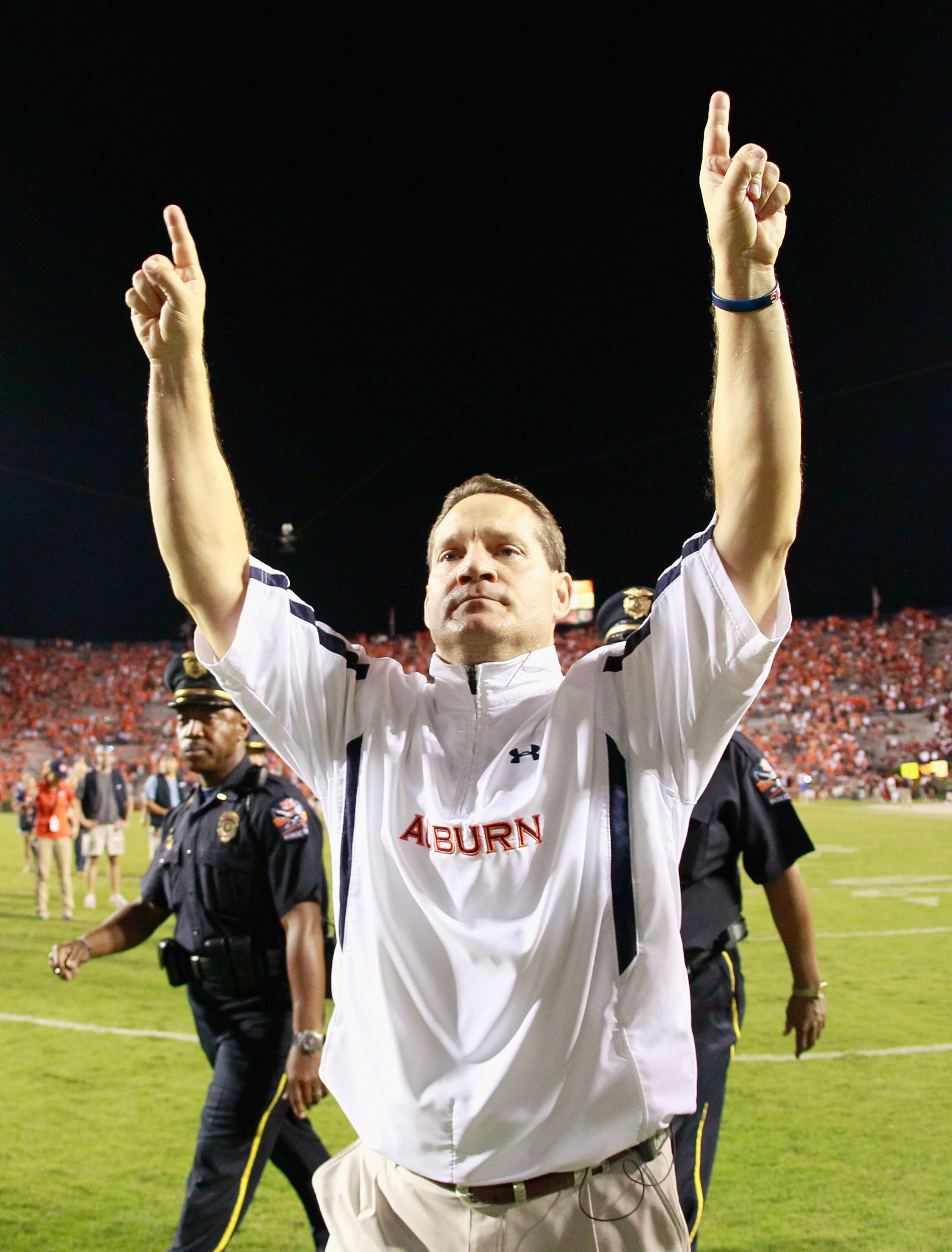 AUBURN, AL - SEPTEMBER 25:  Head coach Gene Chizik of the Auburn Tigers celebrates after their 35-27 win over the South Carolina Gamecocks at Jordan-Hare Stadium on September 25, 2010 in Auburn, Alabama.  (Photo by Kevin C. Cox/Getty Images)