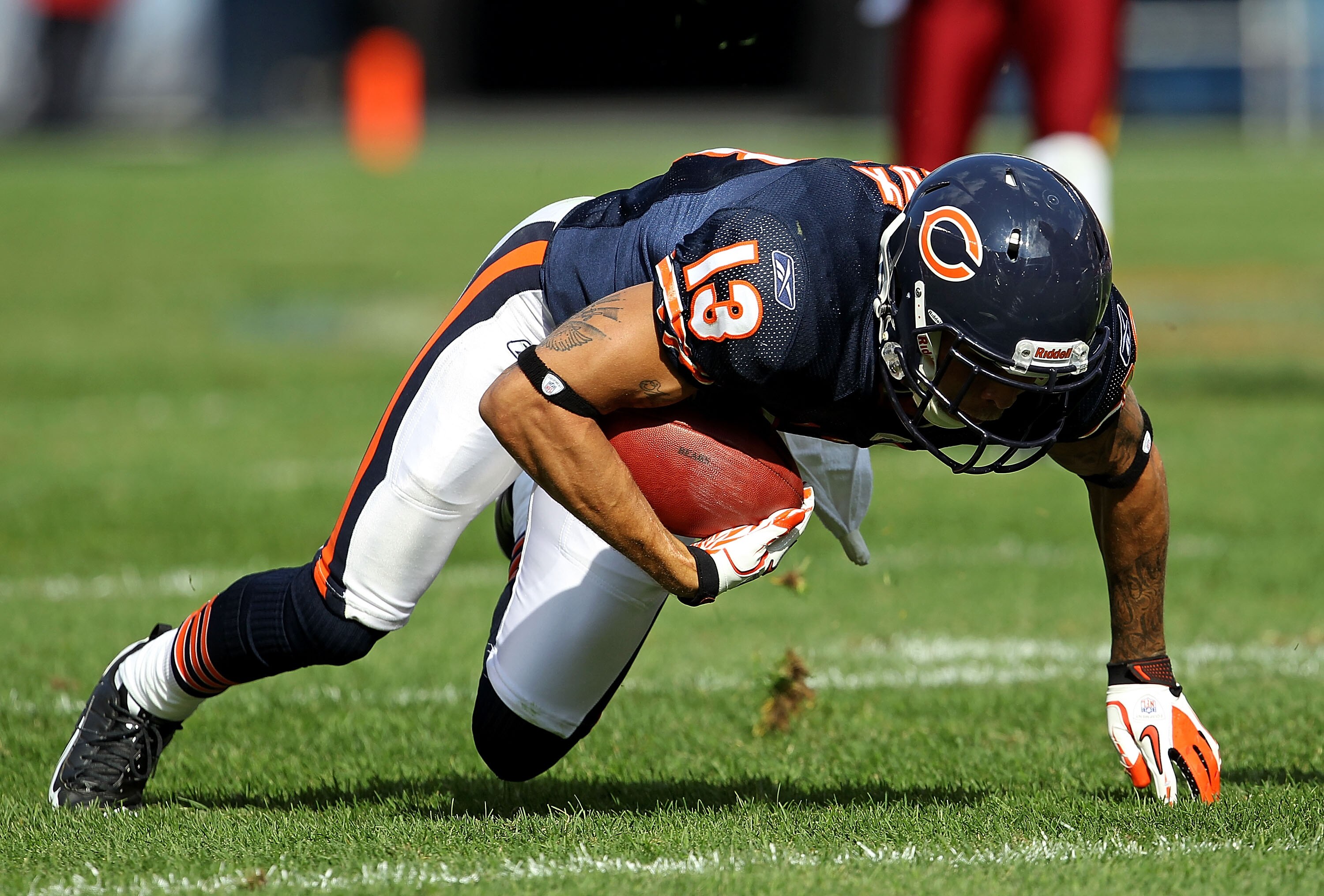 CHICAGO - OCTOBER 24: Johnny Knox #13 of the Chicago Bears tries to keep his balance after a catch against the Washington Redskins at Soldier Field on October 24, 2010 in Chicago, Illinois. The Redskins defeated the Bears 17-14. (Photo by Jonathan Daniel/