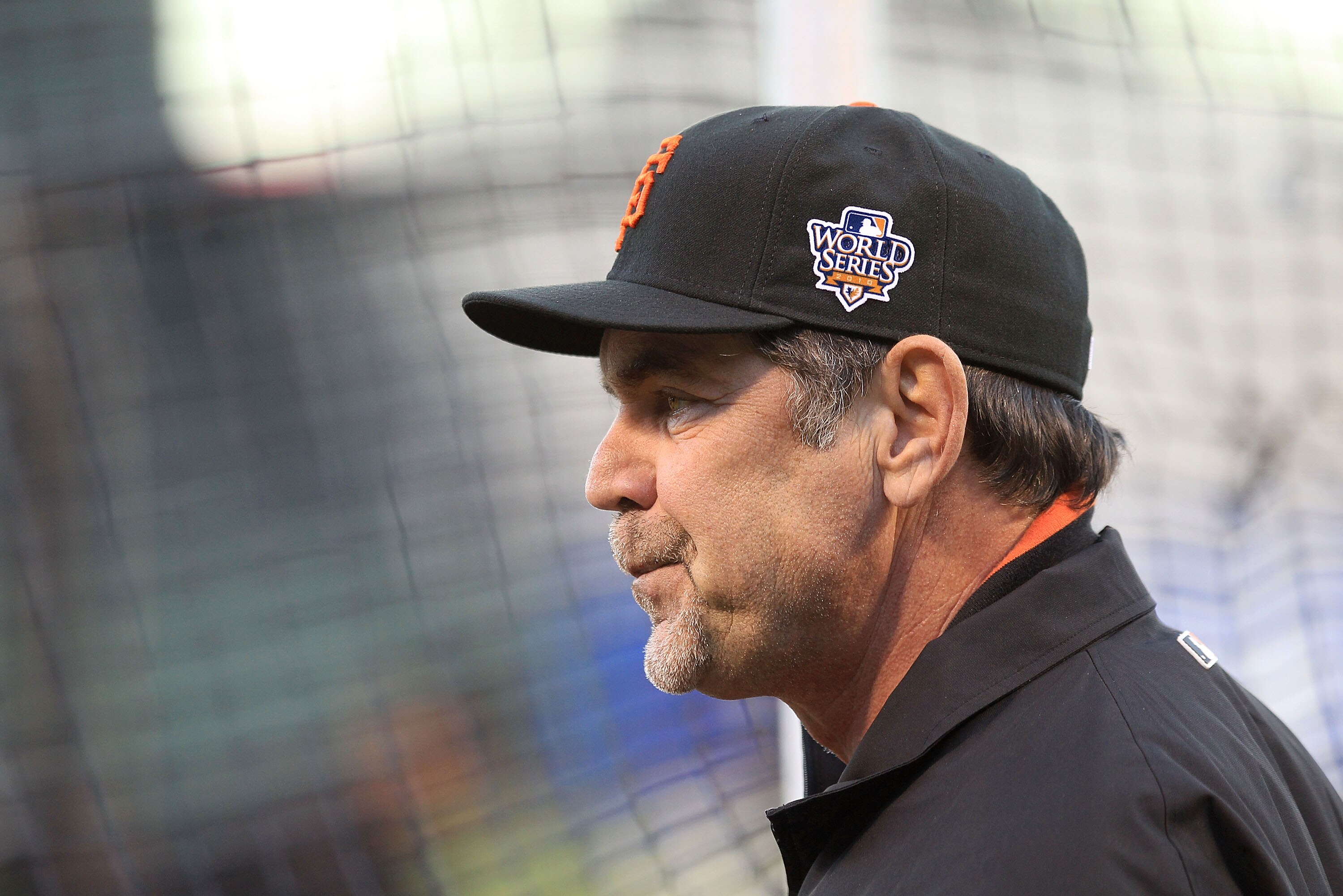 SAN FRANCISCO - OCTOBER 26:  Manager Bruce Bochy of the San Francisco Giants watches his team during a workout session at AT&T Park on October 26, 2010 in San Francisco, California. The Texas Rangers will face off against the San Francisco Giants in Game