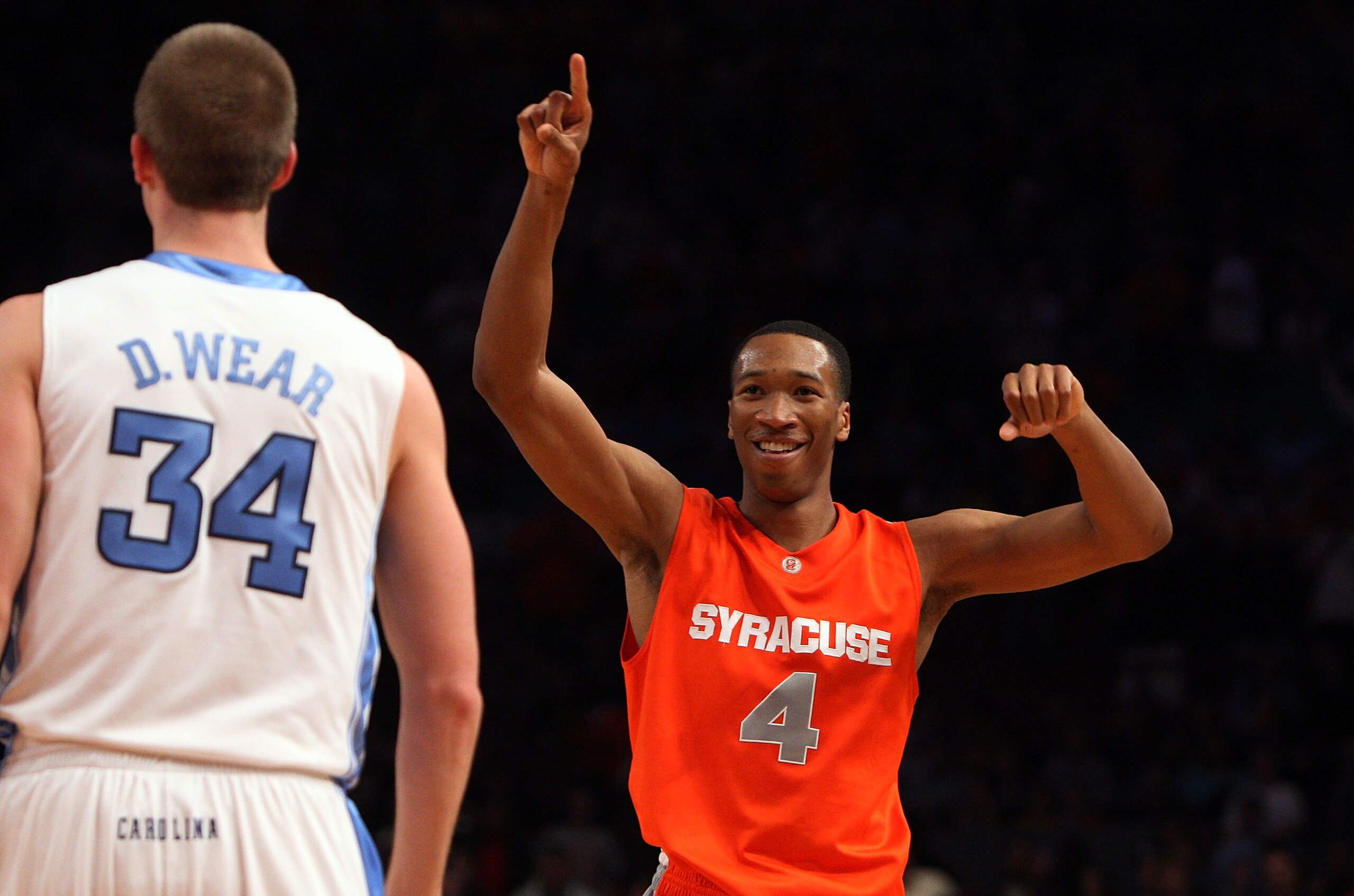 NEW YORK - NOVEMBER 20:  Wes Johnson #4 of the Syracuse Orange celebrates after defeating the North Carolina Tar Heels in the championship game of the 2K Sports Classic on November 20, 2009 at Madison Square Garden in New York City. The Orange defeated th