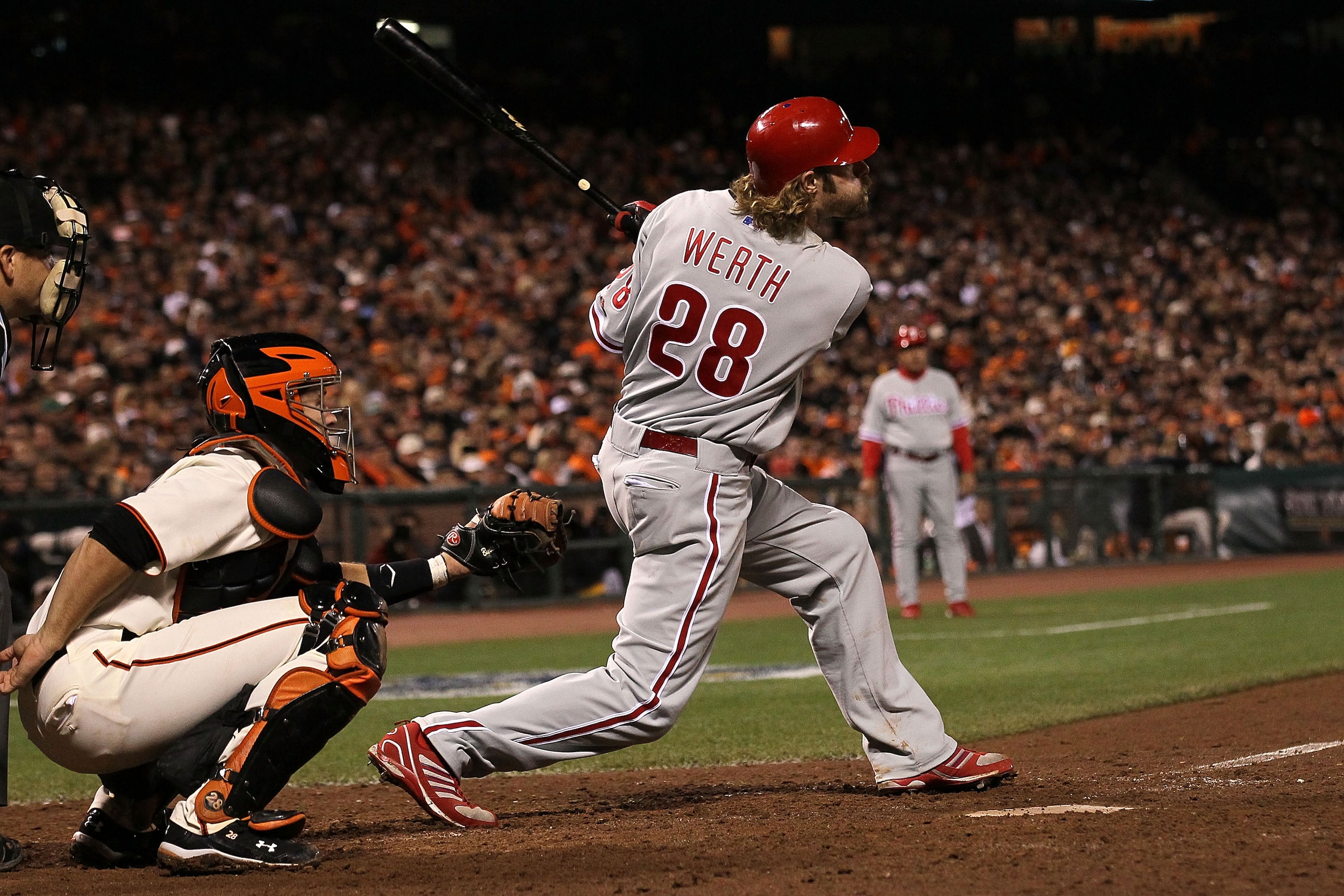 SAN FRANCISCO - OCTOBER 21:  Jayson Werth #28 of the Philadelphia Phillies hits a solo homerun off Ramon Ramirez #52 of the San Francisco Giants in the ninth inning of Game Five of the NLCS during the 2010 MLB Playoffs at AT&T Park on October 21, 2010 in