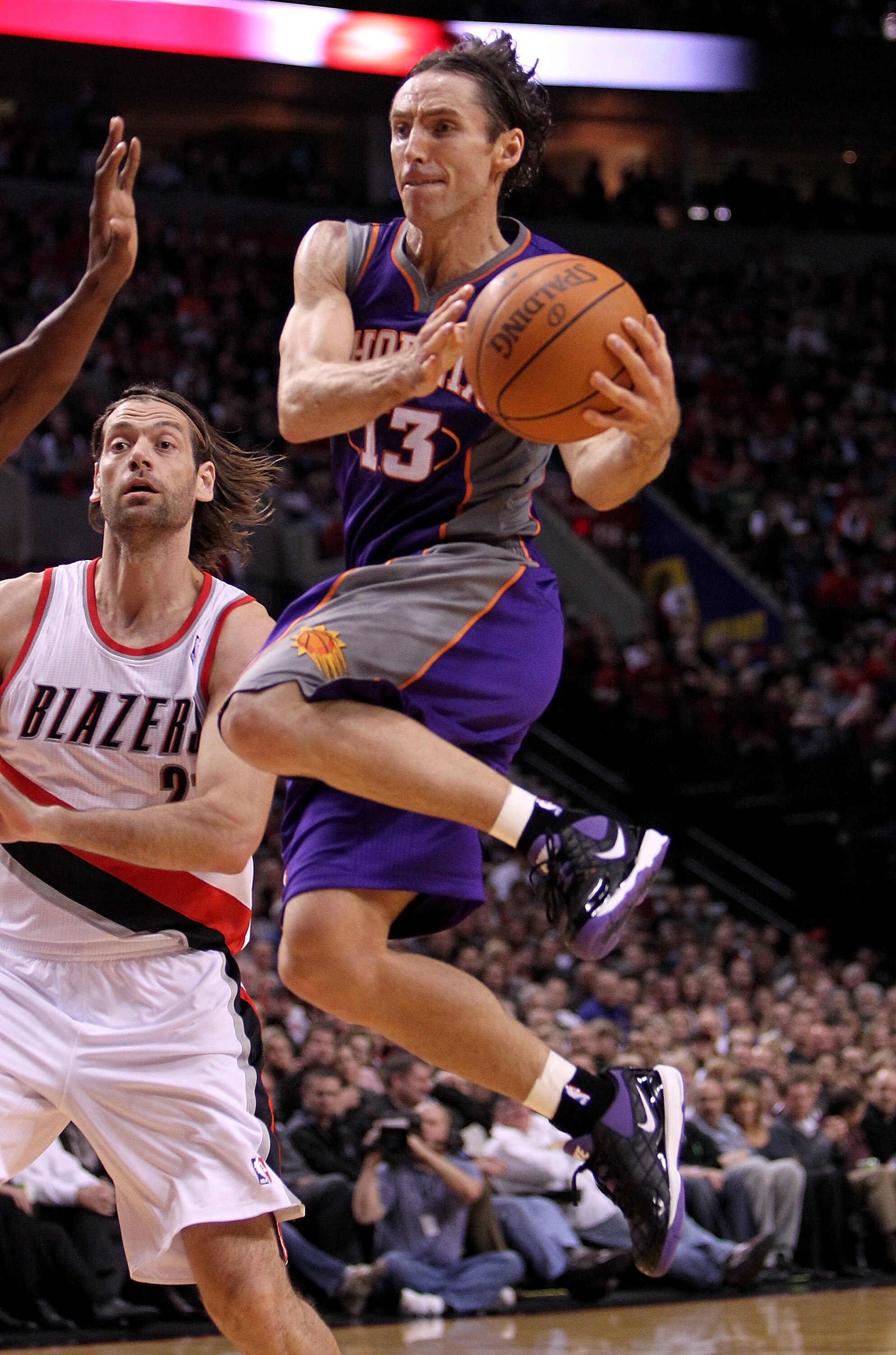 PORTLAND, OR - OCTOBER 26:  Steve Nash #13 of the Phoenix Suns drives with the ball agianst the Portland Trail Blazers on October 26, 2010 at the Rose Garden in Portland, Oregon.  NOTE TO USER: User expressly acknowledges and agrees that, by downloading a