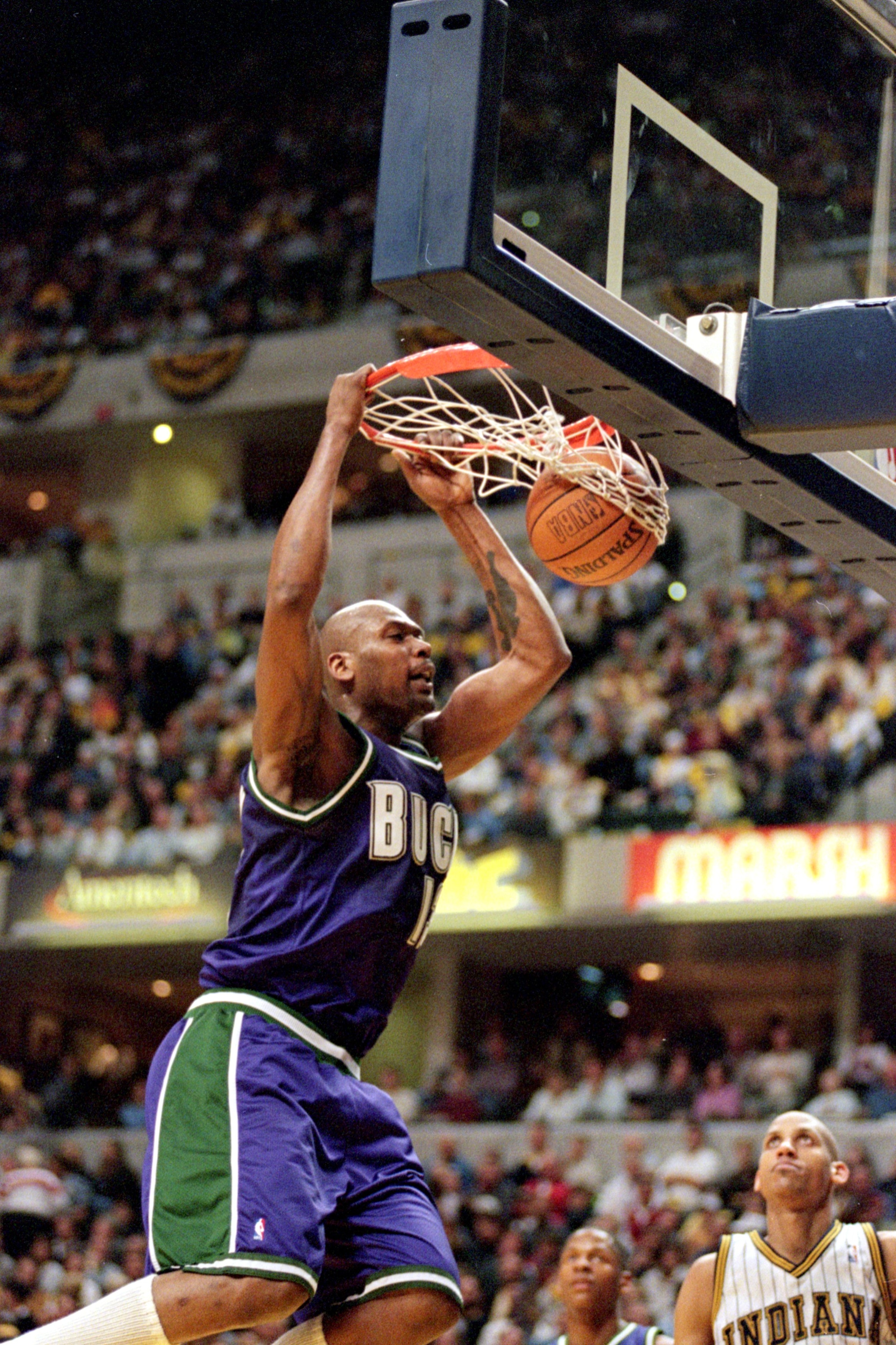 23 Apr 2000: Glenn Robinson #13 of the Milwaukee Bucks makes a slam dunk during the NBA Eastern Conference Playoffs Round One Game against the Indiana Pacers at the Conseco Fieldhouse in Indianapolis, Indiana. The Pacers defeated the Bucks 88-85..   Manda