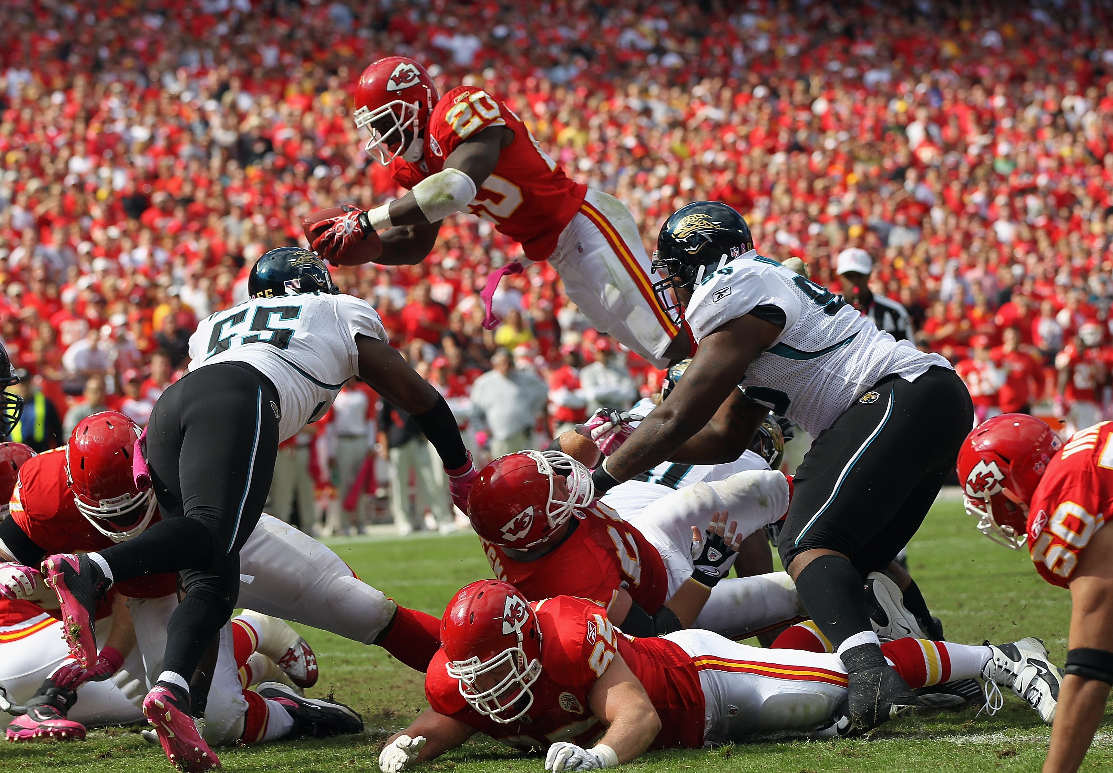 KANSAS CITY, MO - OCTOBER 24:  Running back Thomas Jones #20 of the Kansas City Chiefs carries the ball up and over for a touchdown during the game against the Jacksonville Jaguars on October 24, 2010 at Arrowhead Stadium in Kansas City, Missouri.  (Photo