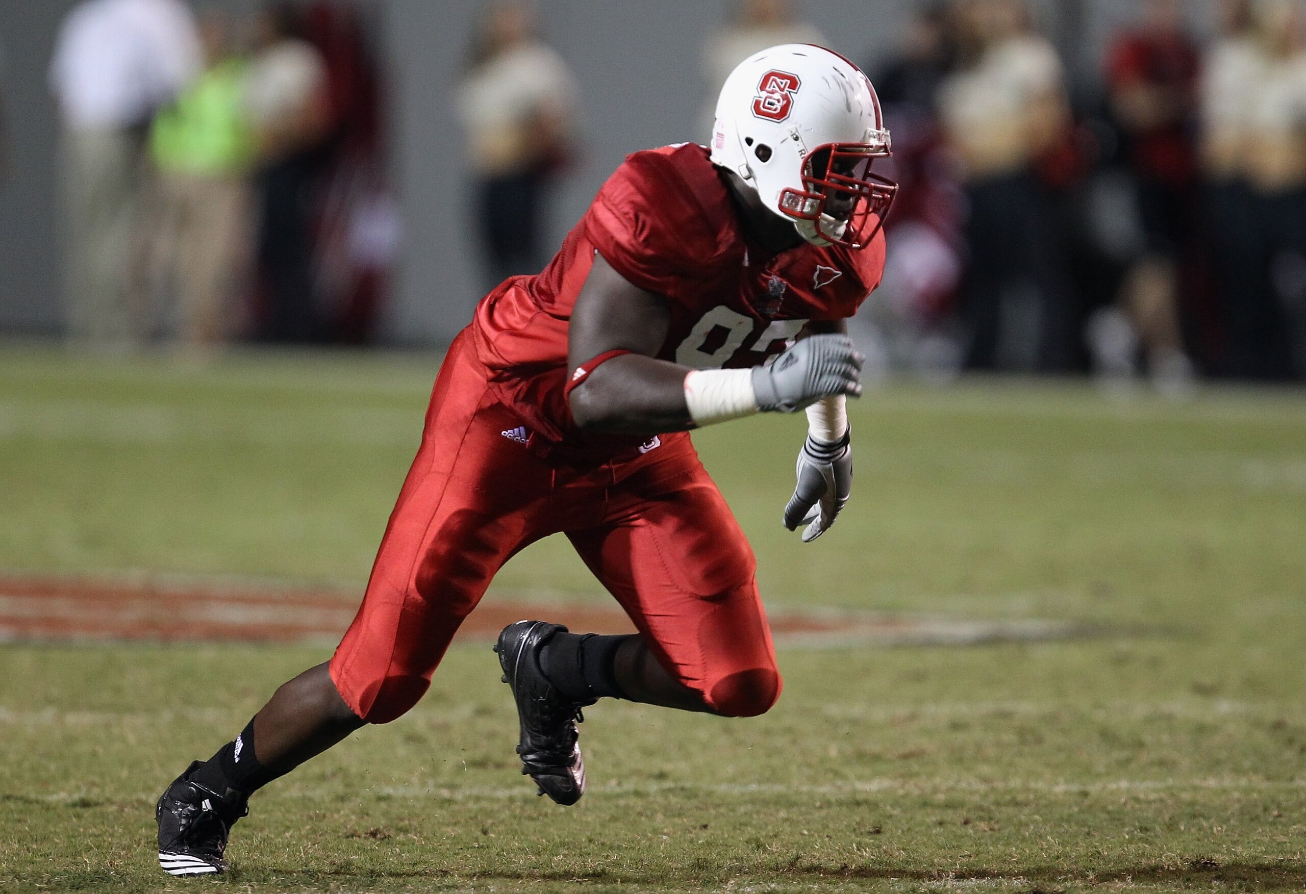 RALEIGH, NC - SEPTEMBER 16:  David Akinniyi #97 of the North Carolina State Wolfpack during their game at Carter-Finley Stadium on September 16, 2010 in Raleigh, North Carolina.  (Photo by Streeter Lecka/Getty Images)