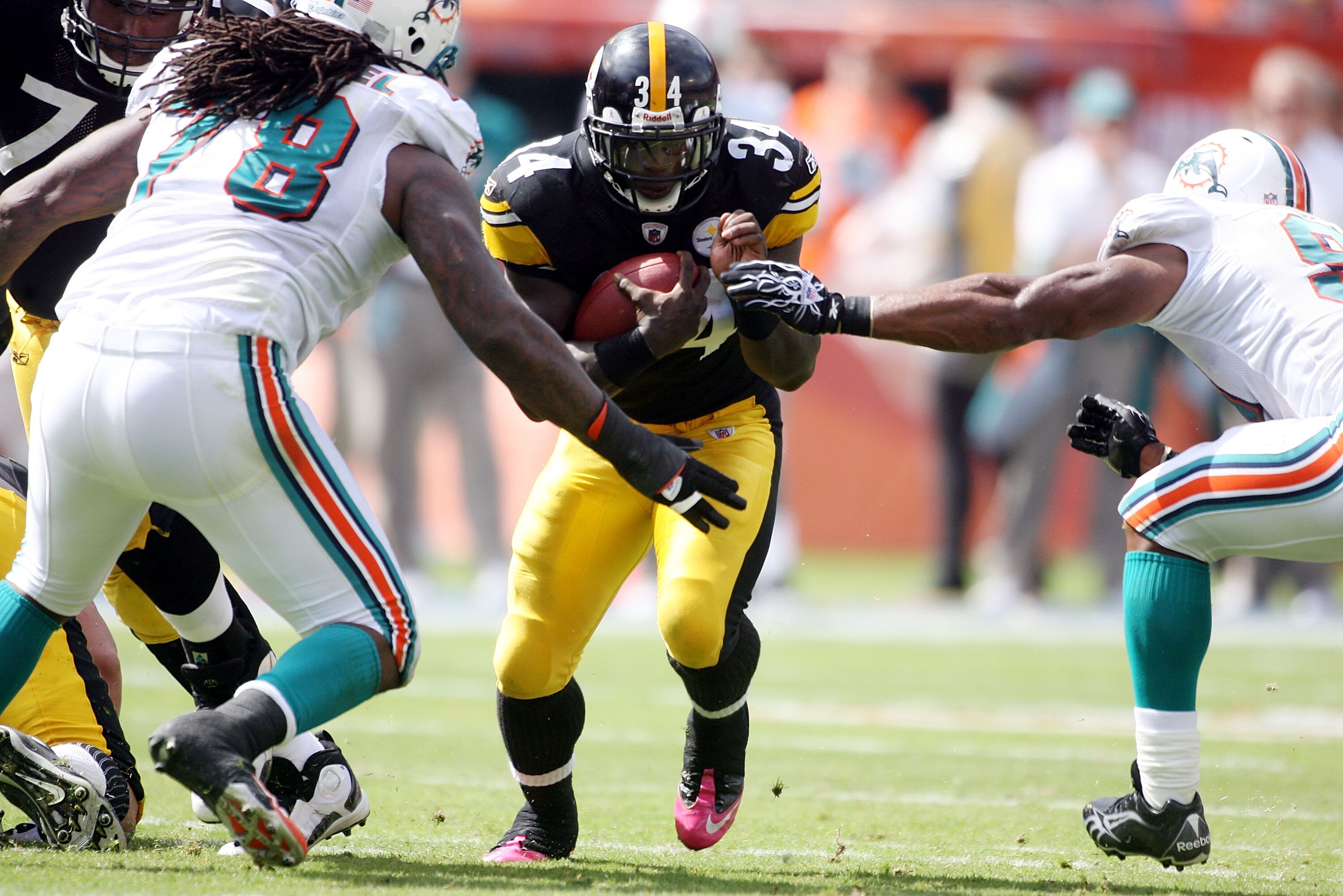 MIAMI - OCTOBER 24:  Running back Rashard Mendenhall #34 carries the ball against the Miami Dolphins at Sun Life Stadium on October 24, 2010 in Miami, Florida.  (Photo by Marc Serota/Getty Images)