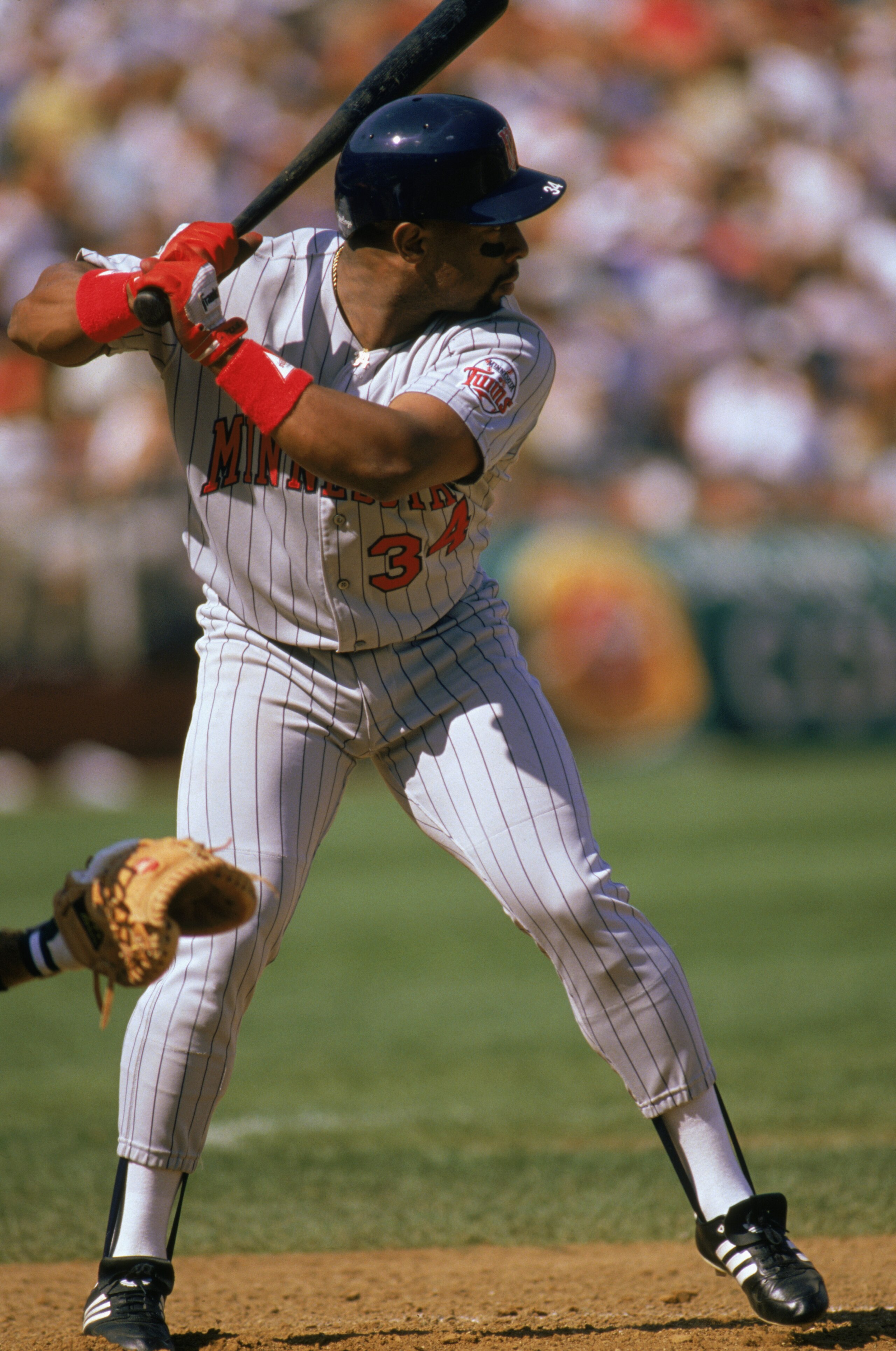 1988:  Kirby Puckett of the Minnesota Twins stands ready at bat during a game in the 1988 season.  (Photo by: Otto Greule Jr/Getty Images)